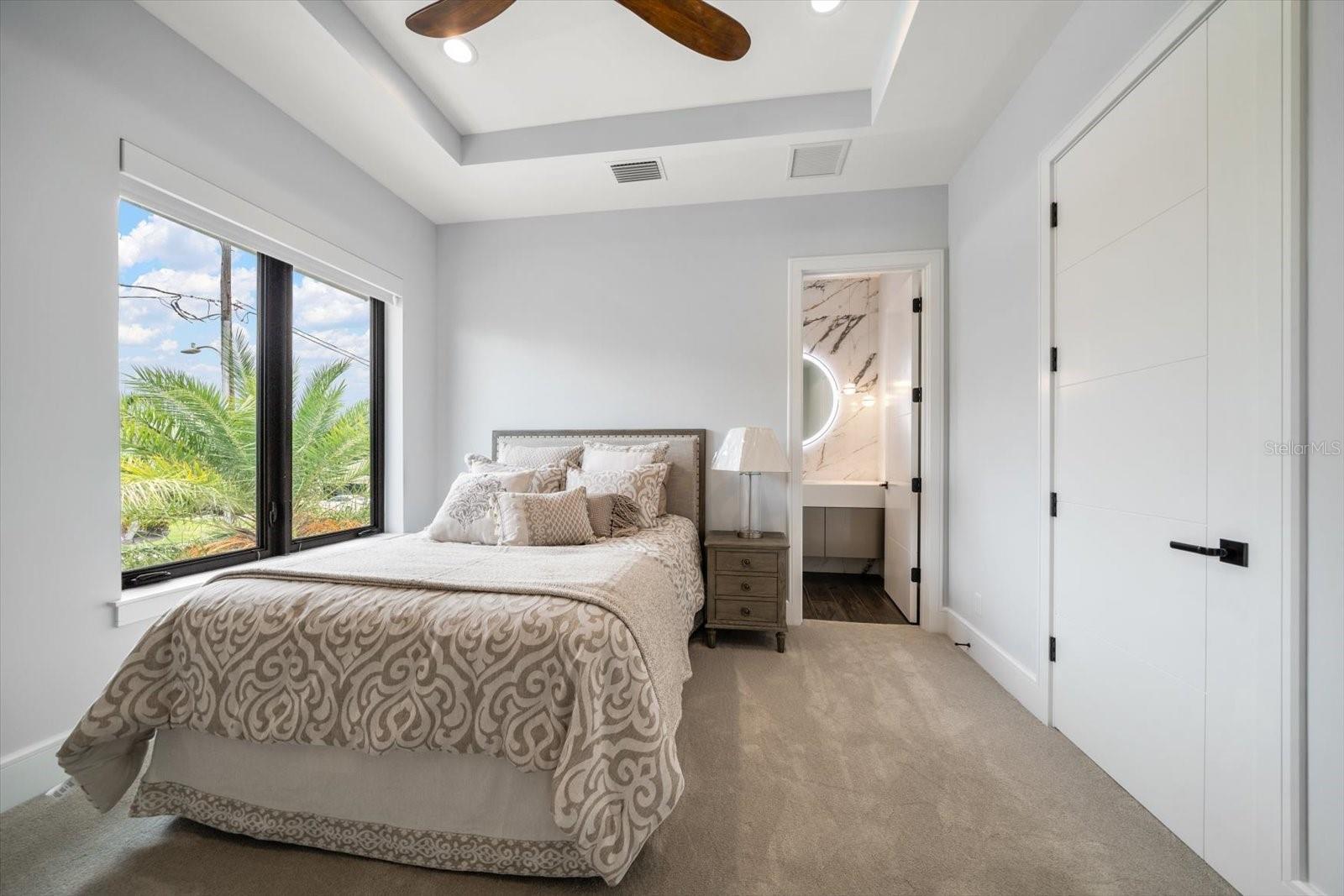 Guest bedroom suite on first living level.