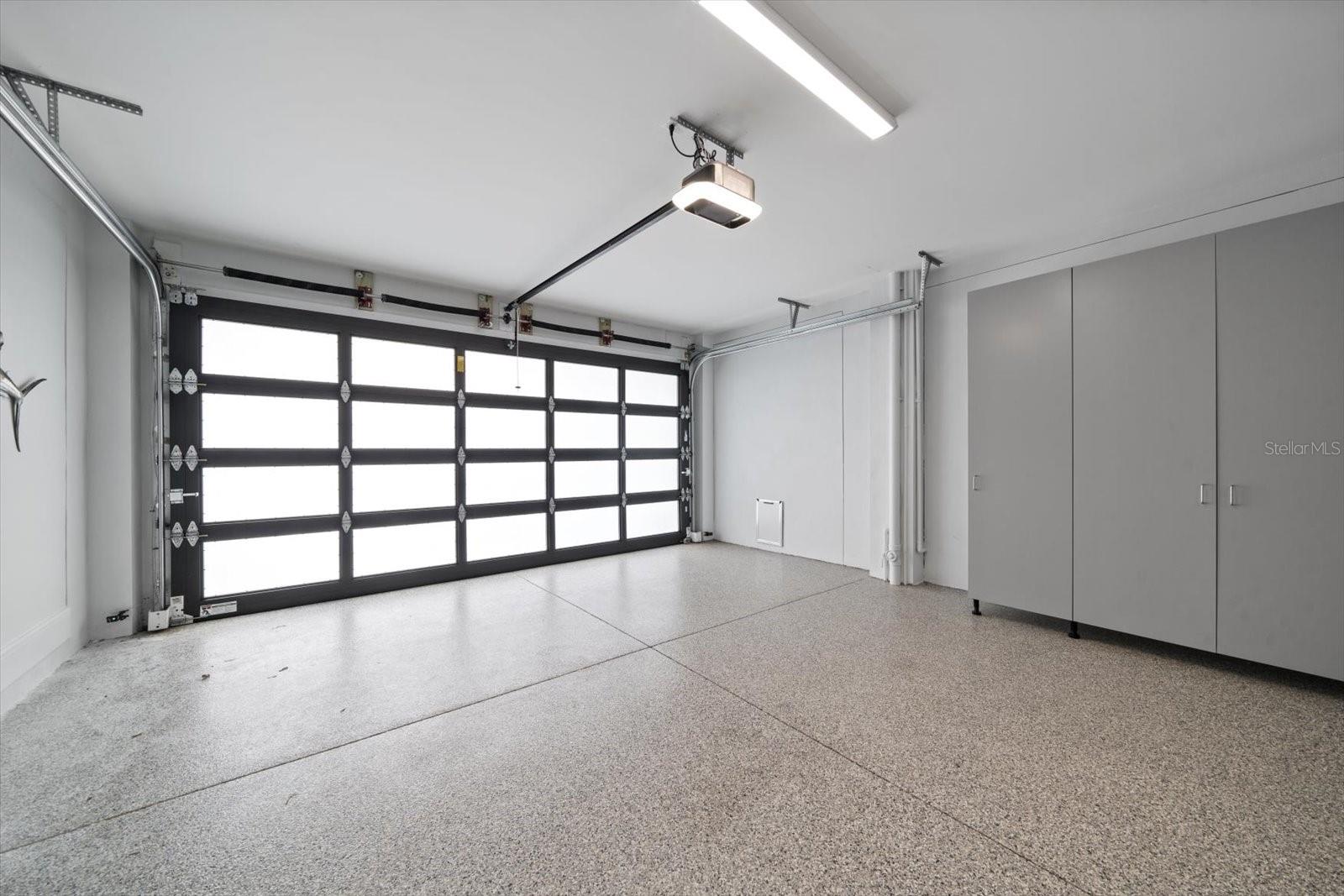 South side garage with parking for 4 vehicles, and storage areas