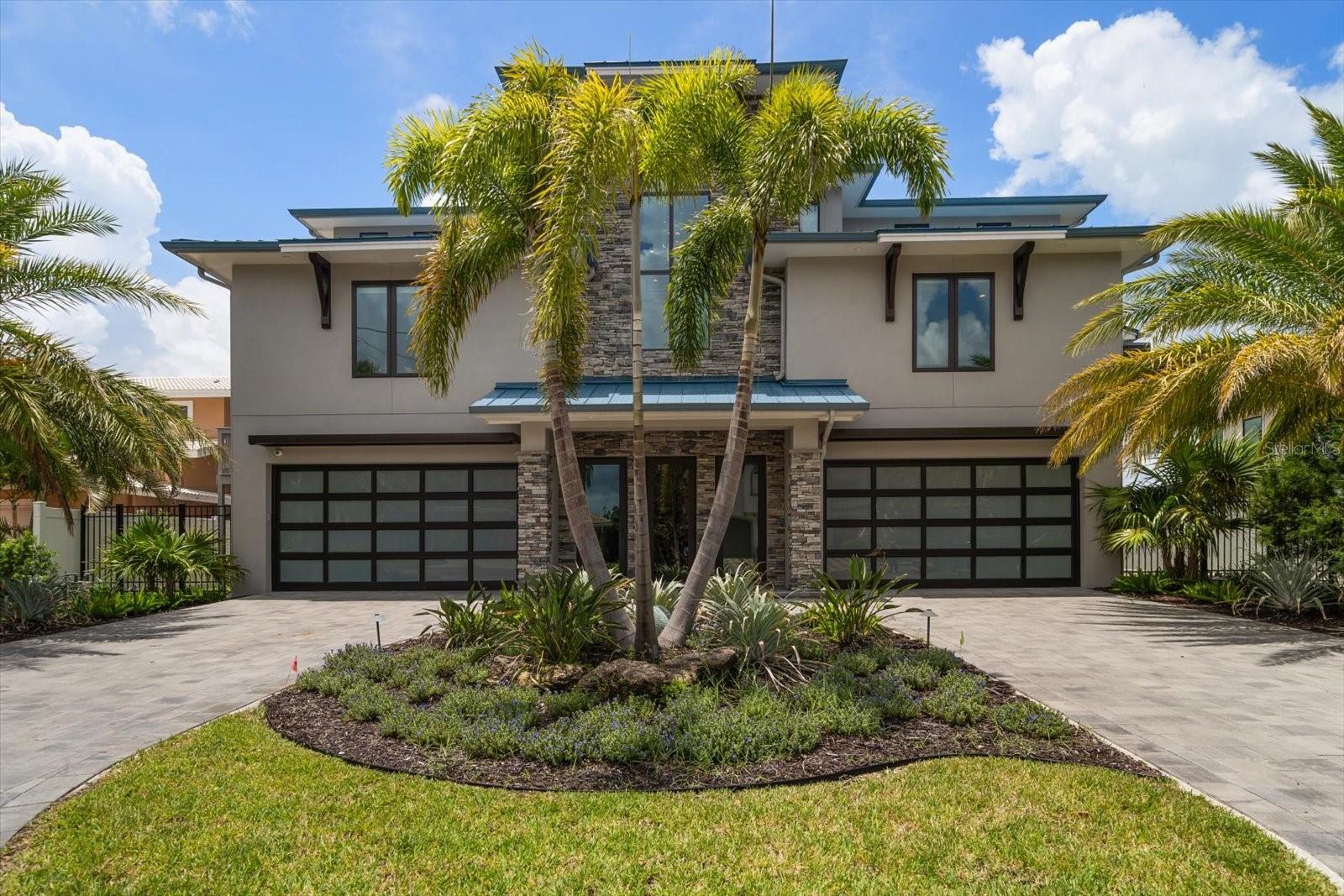 Stately facade, and manicured grounds create an impressive arrival.
