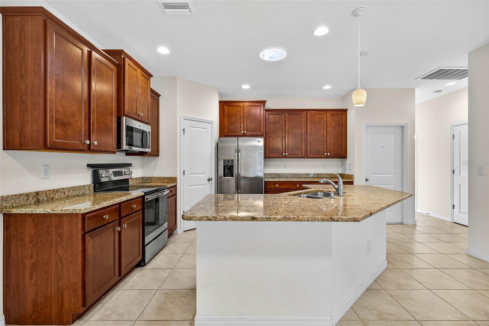 Make cooking enjoyable in this space as you look on toward your living and dining areas.