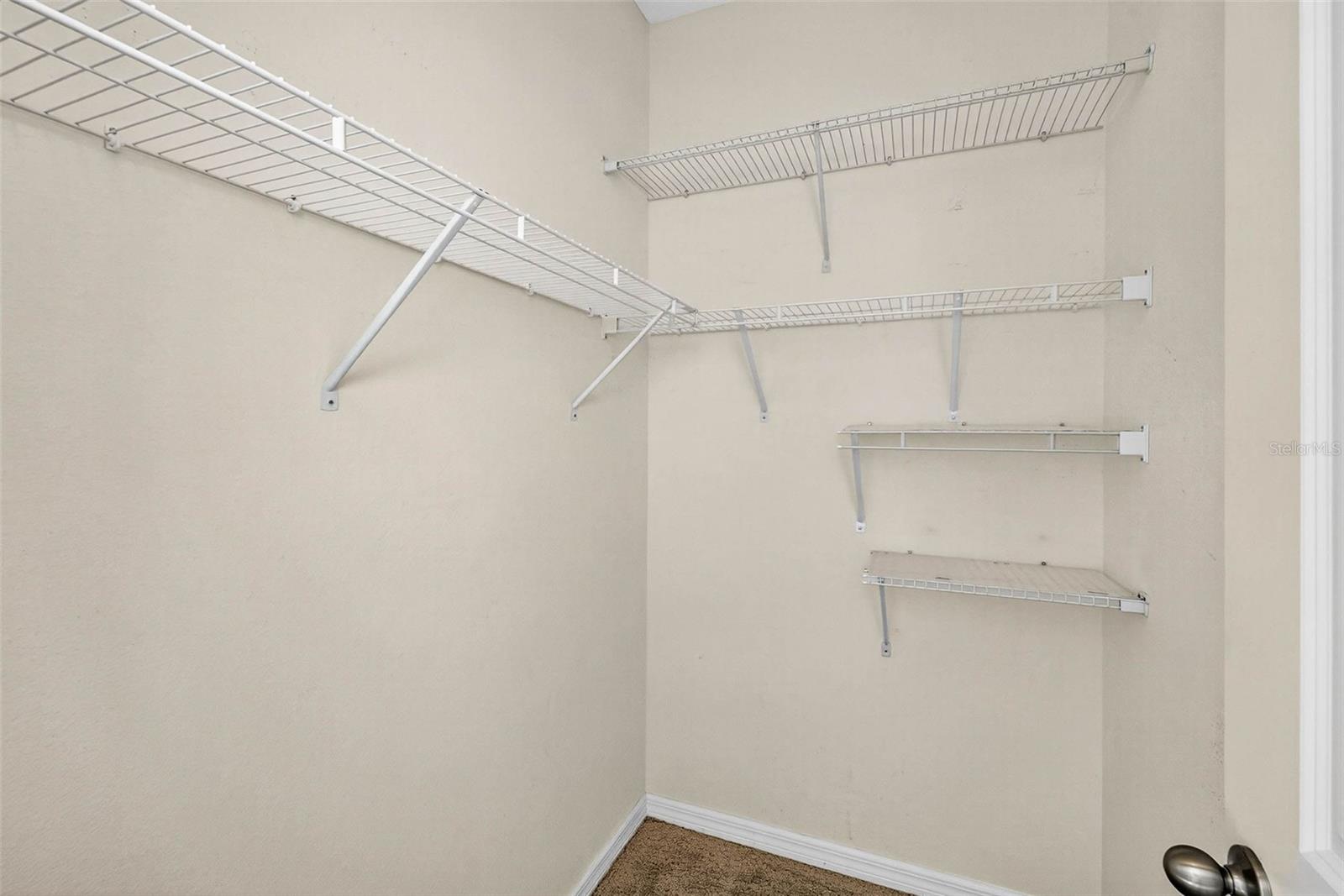 HUGE walk in closet in the primary bedroom