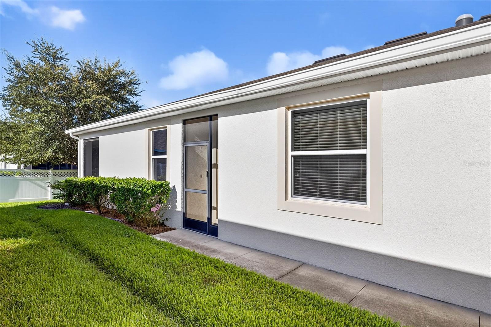 Your front walkway extends from the driveway to the front door or enter through the two car garage.