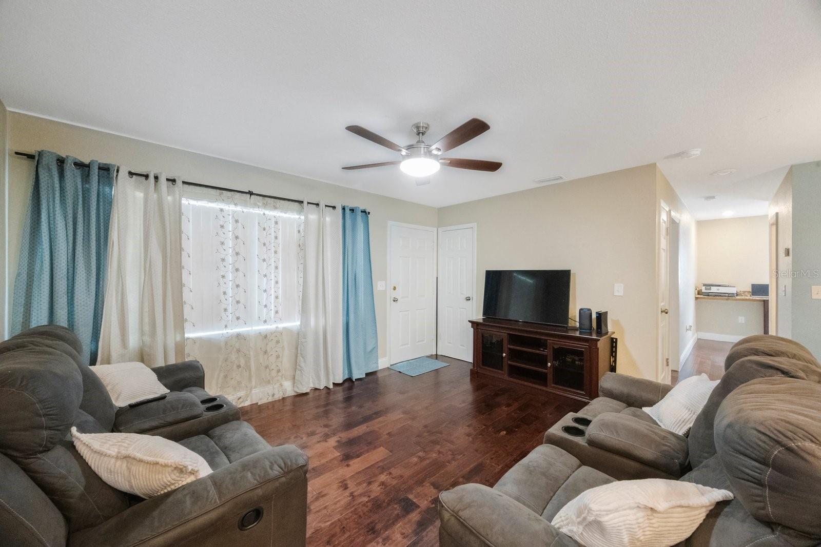 The large front window brings in a lot of light.