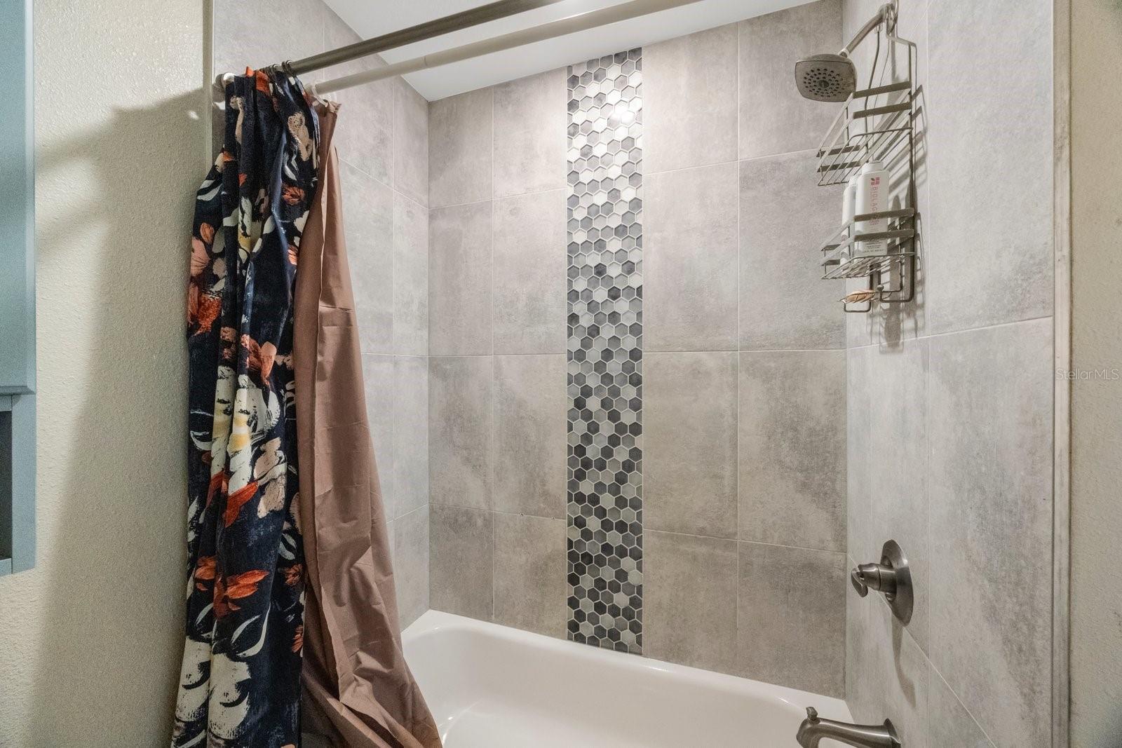 Shower with tub.
