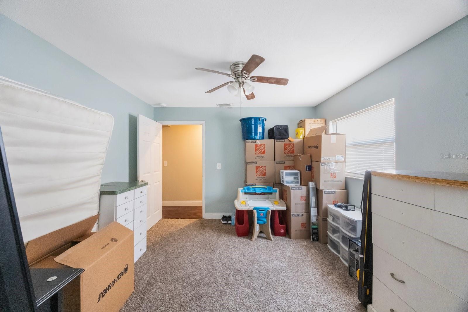 3rd bedroom. Packing has begun.