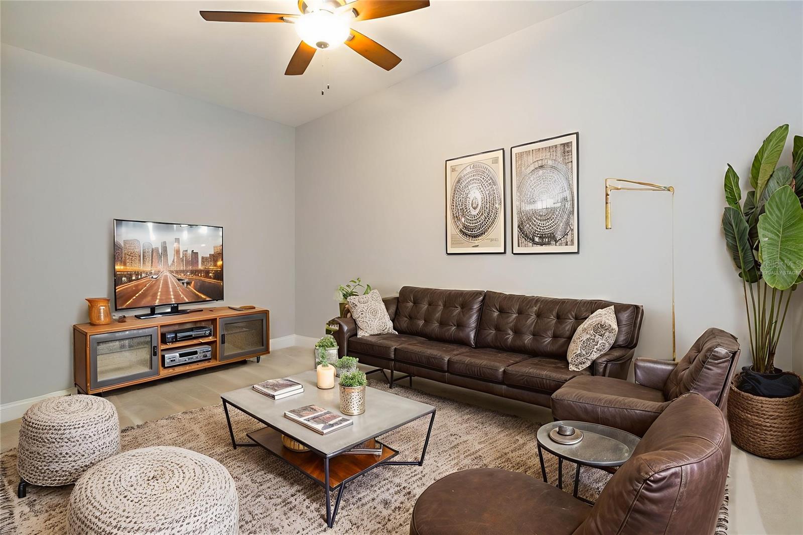 Virtually staged den as 2nd family room