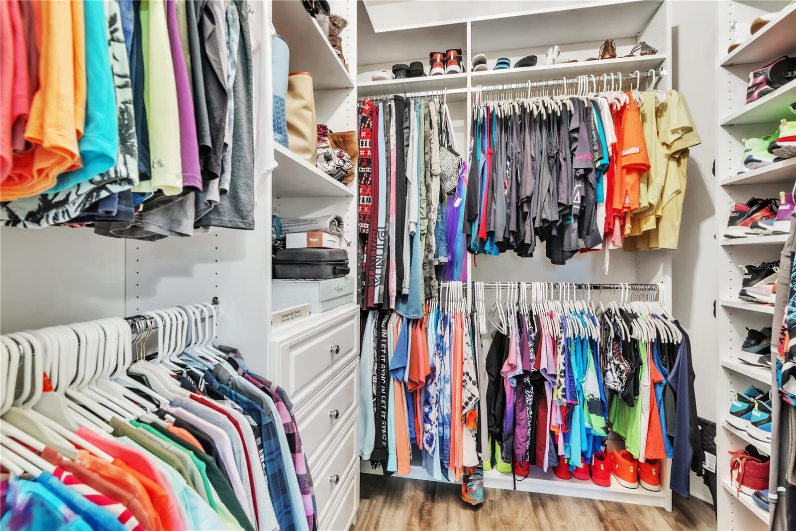 1 of 2 large walk in closets in the master suite