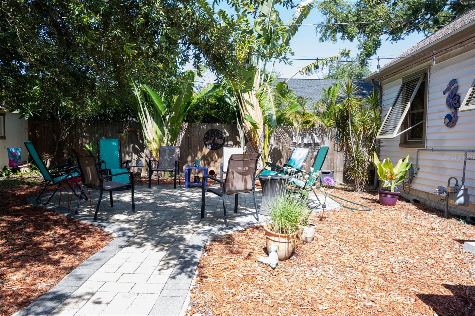 backyard, path to gathering, fire pit area