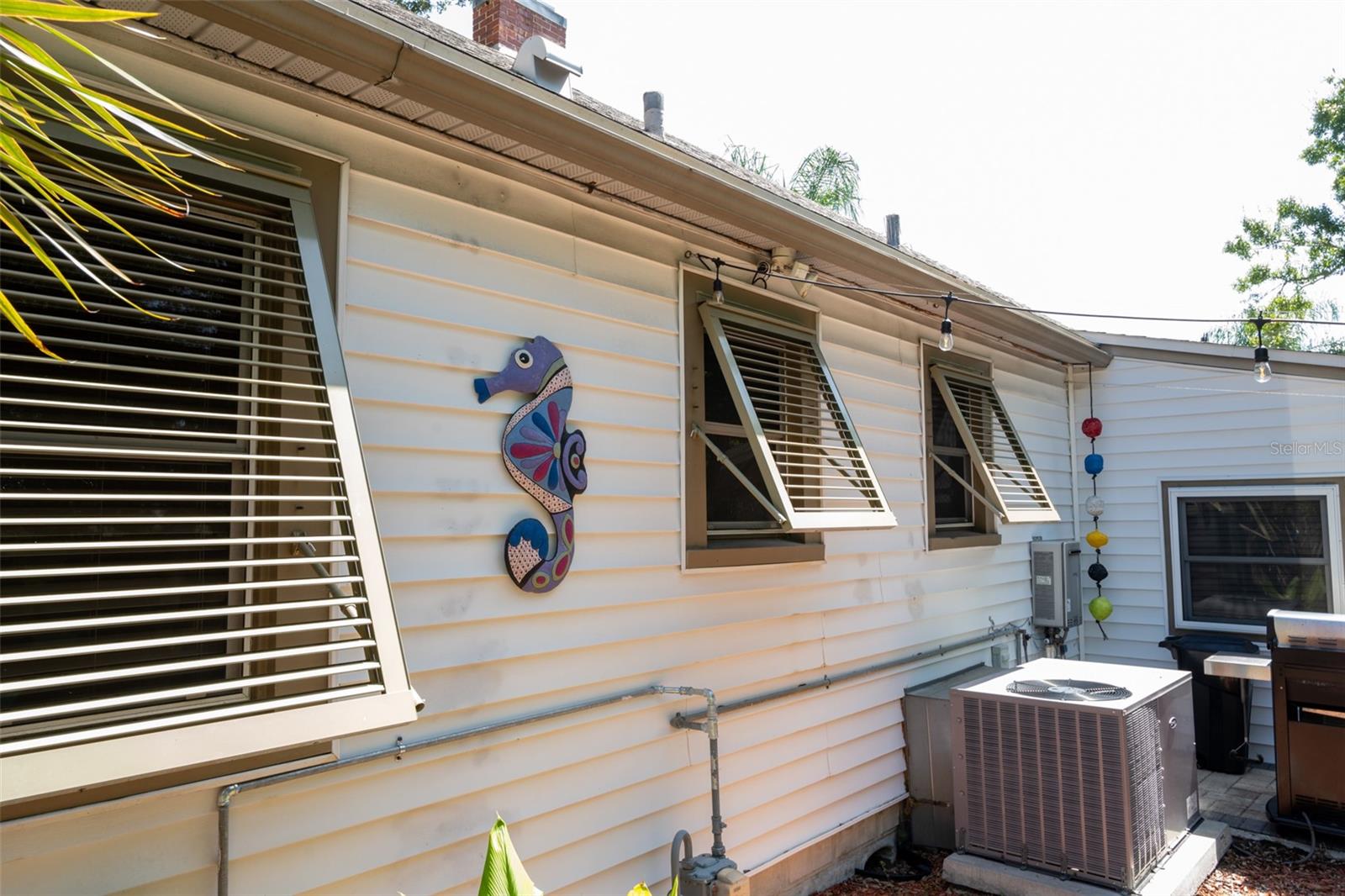 backyard ac, metal hurricane shutters