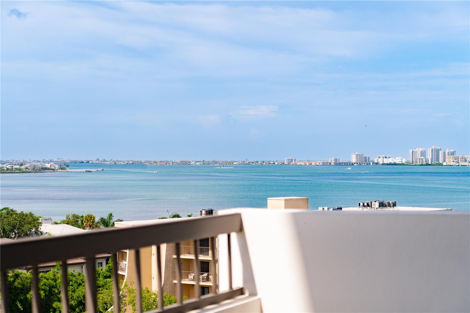 Gorgeous balcony view all the way to the beach.