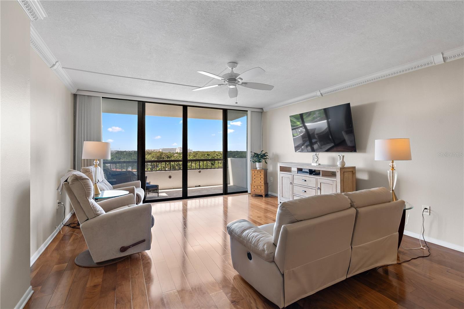 The Living Room has 4 sliding doors to the balcony with its gorgeous view of the water.