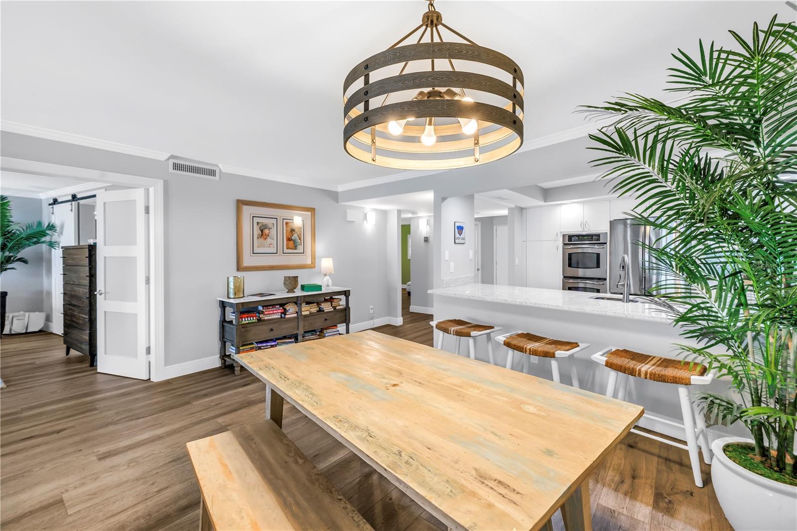 Dining area and breakfast bar.  The open door to the left is to the primary suite
