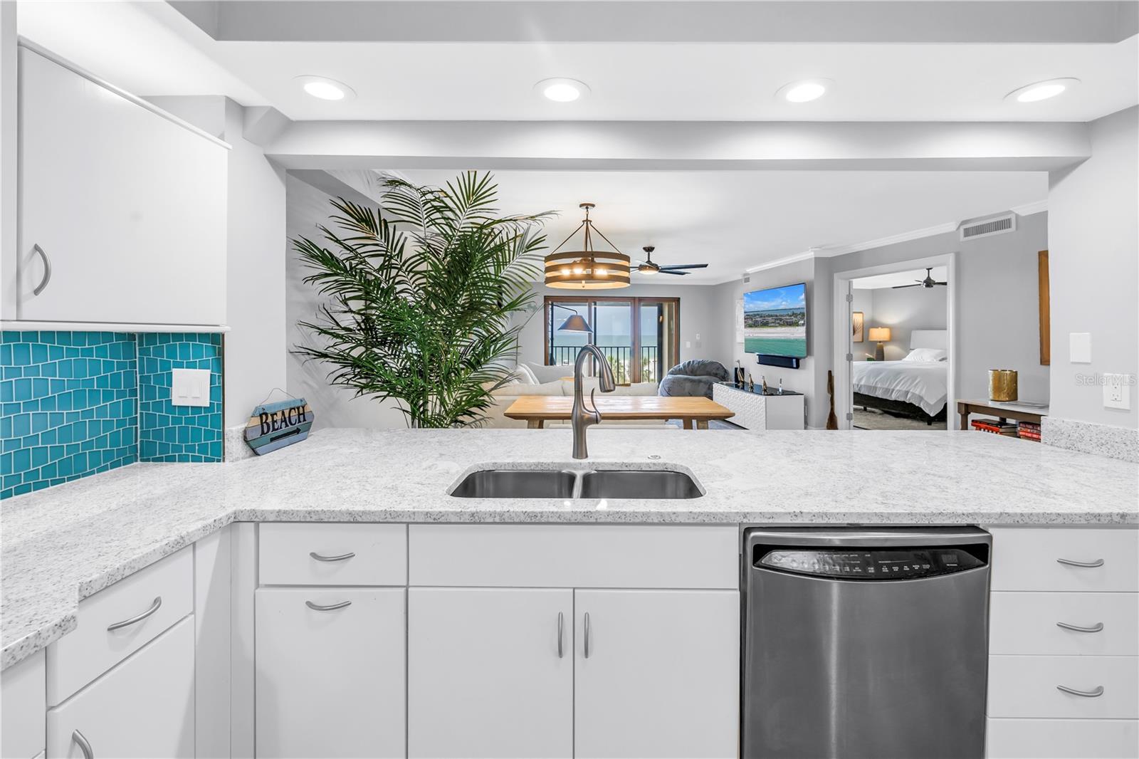 View from the kitchen into the dining and living areas