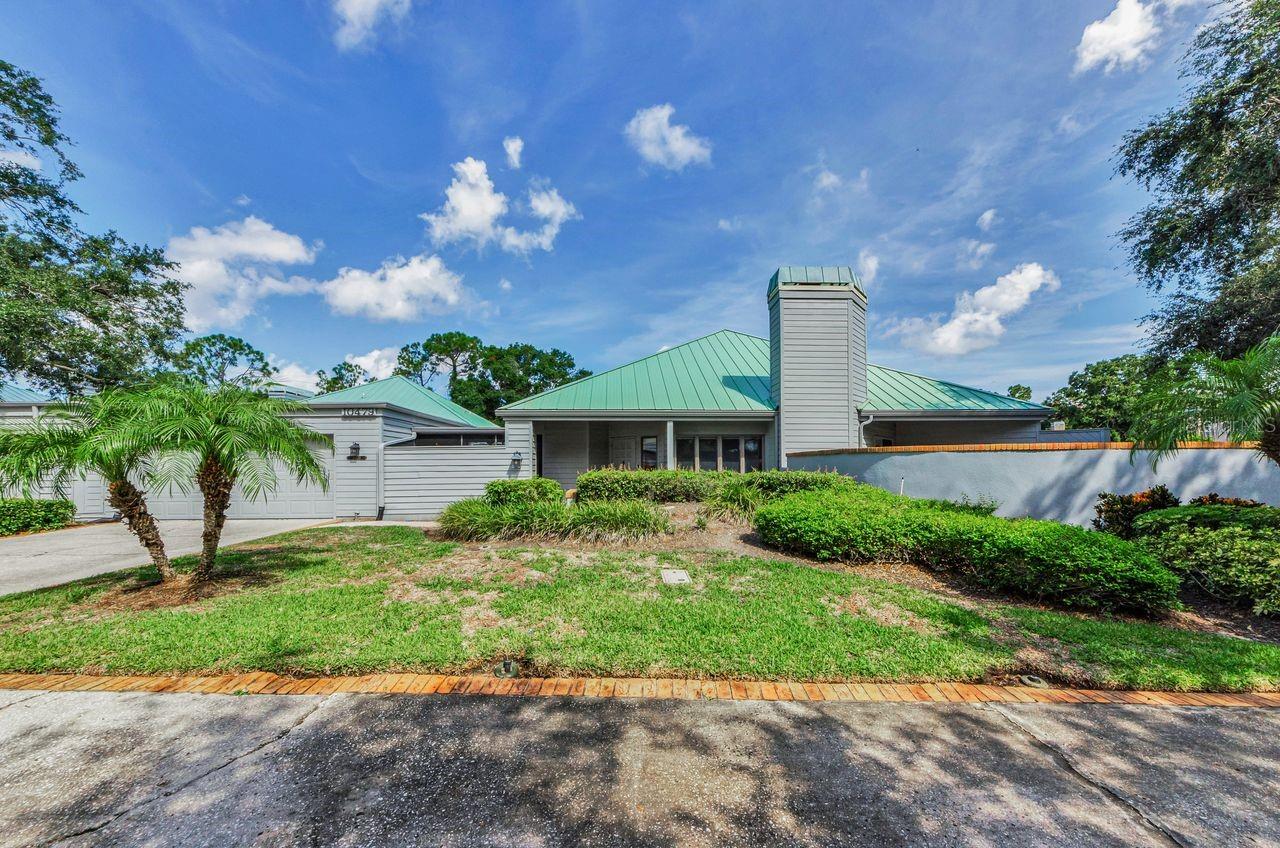 10479 Longwood Drive, The Arbors at Bardmoor, with new roof and so much elegant space!