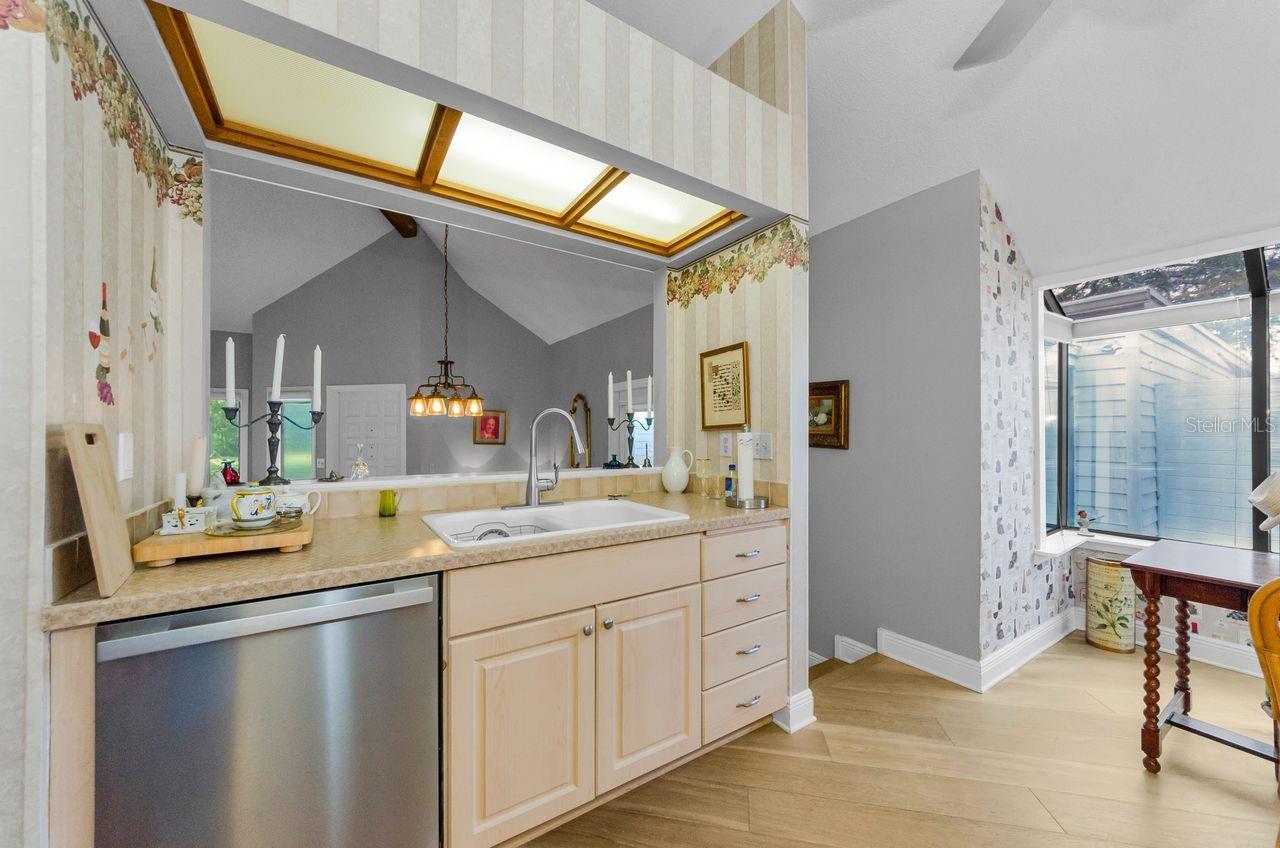 Kitchen sink overlooks the dining and living room.