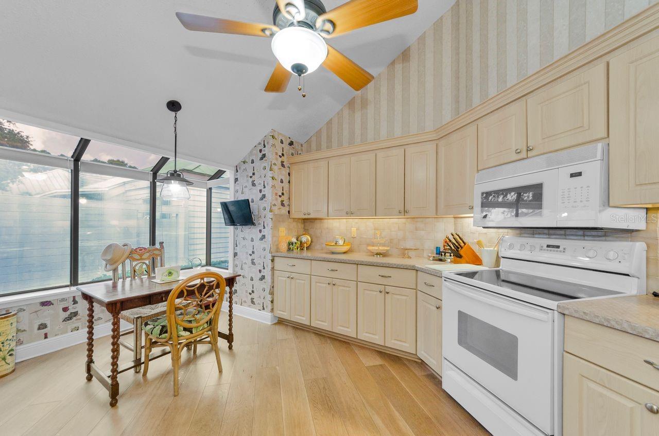 Kitchen with garden window, (there is a film on the outside of these windows for sunblock).