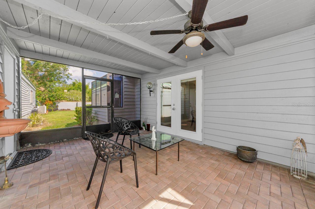 Lovely breezeway looking into the back yard and the French doors into the dining room of the villa. (garage on your left.)