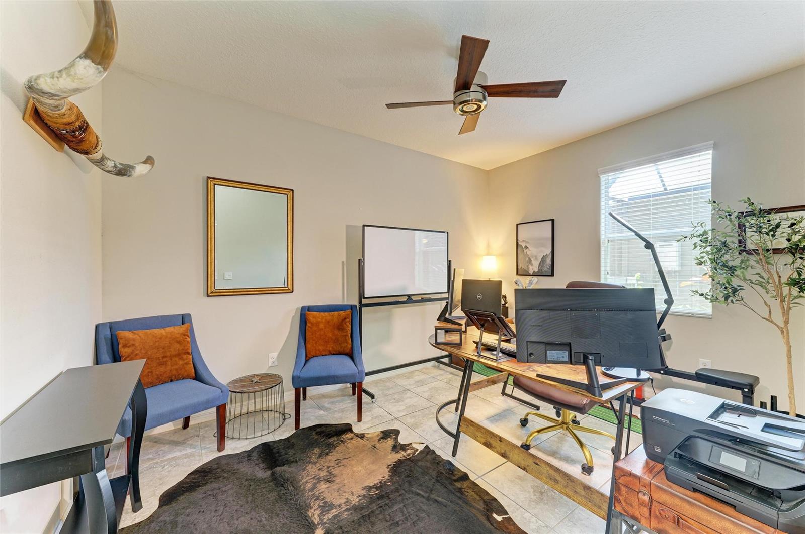 Versatile first-floor flex room—perfect for an office, guest suite, playroom, or whatever you need.