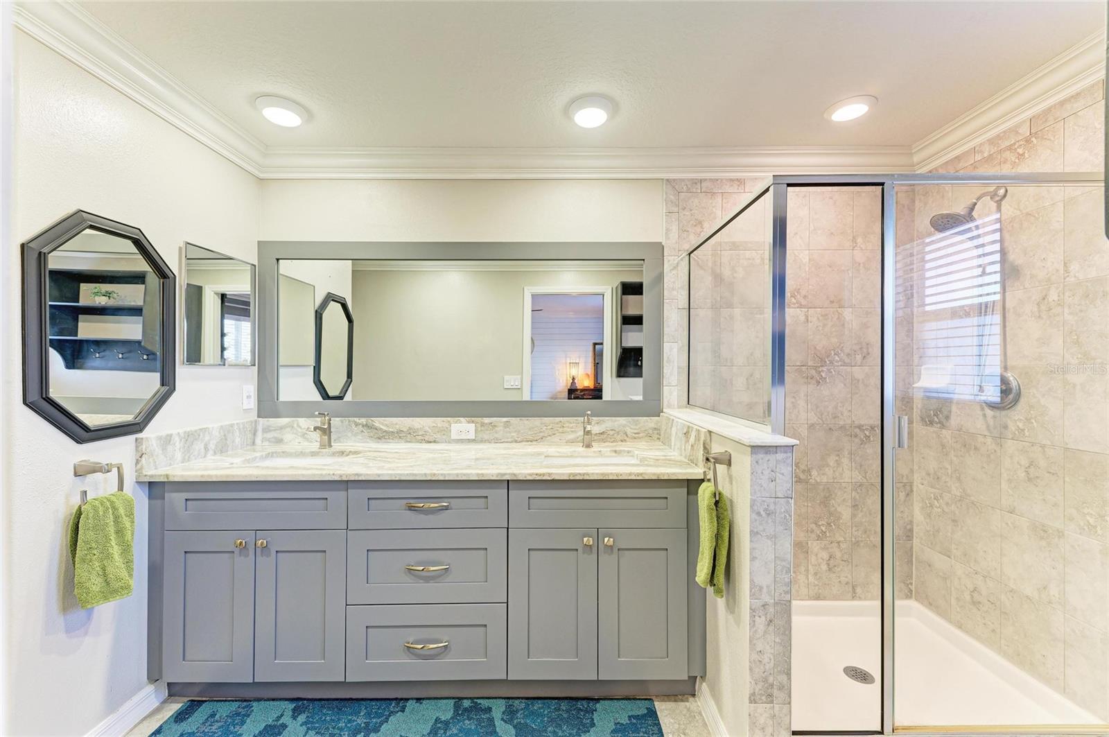 Tastefully updated, spa-inspired primary bathroom