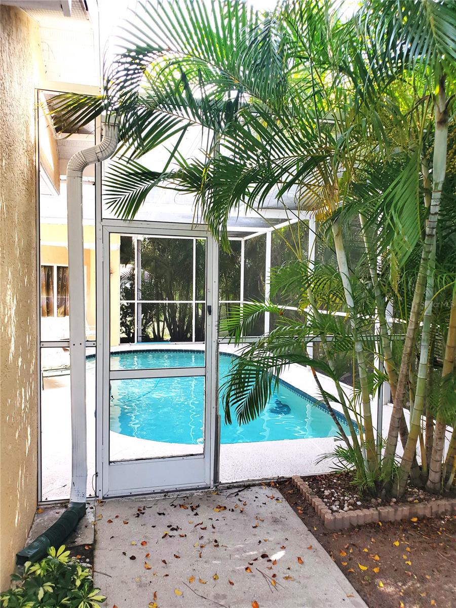 Entrance to pool from back yard