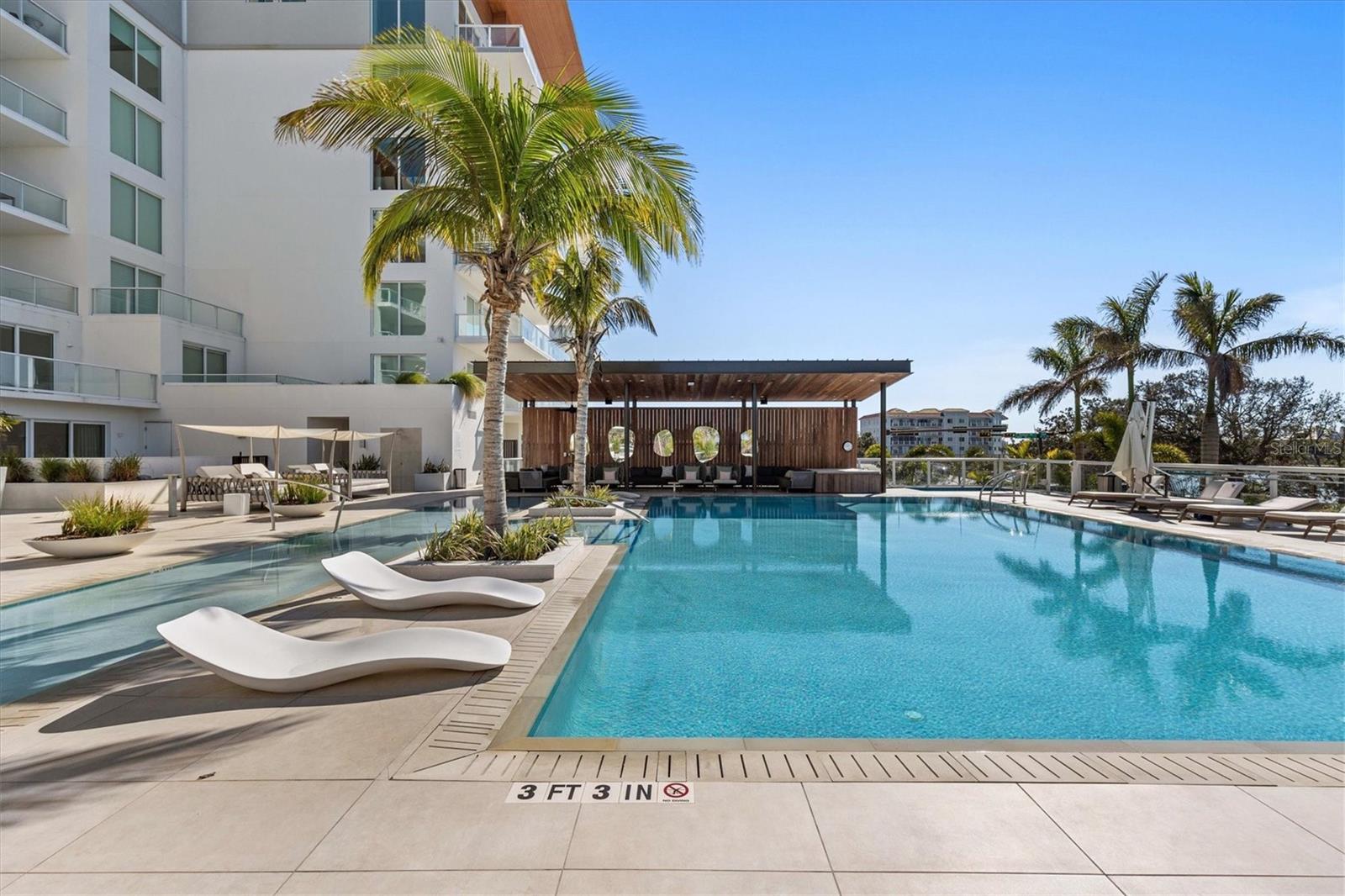 Poolside Cabanas + Lounge Chairs