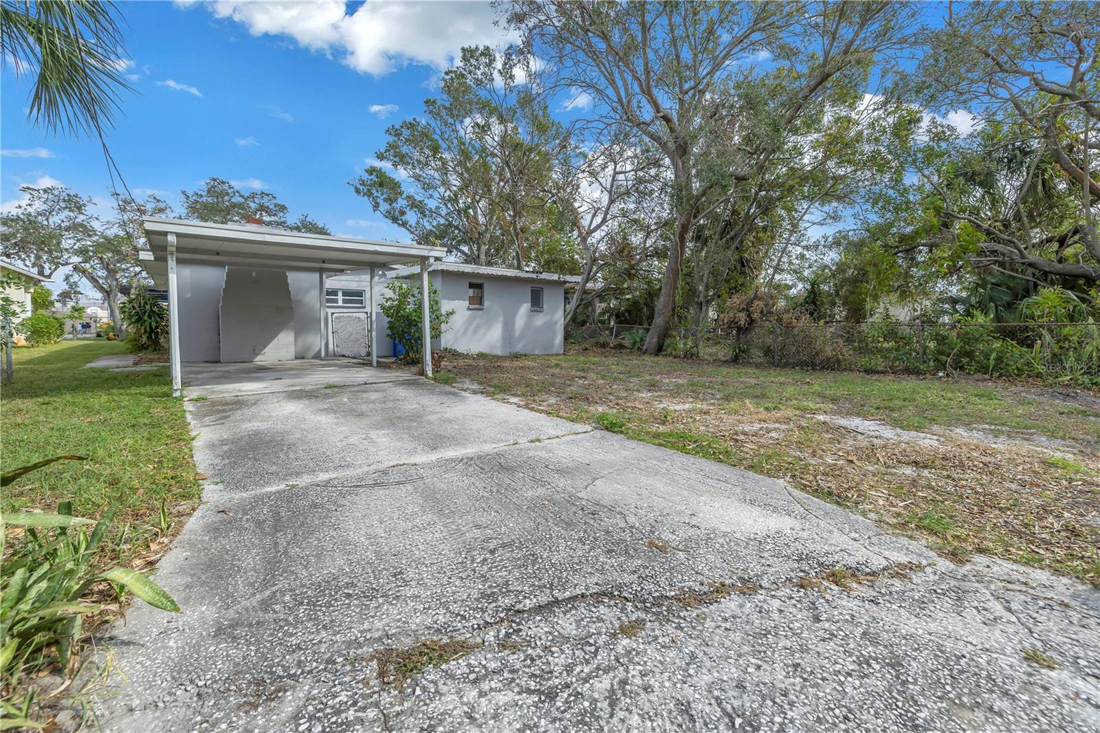 Carport and extended driveway