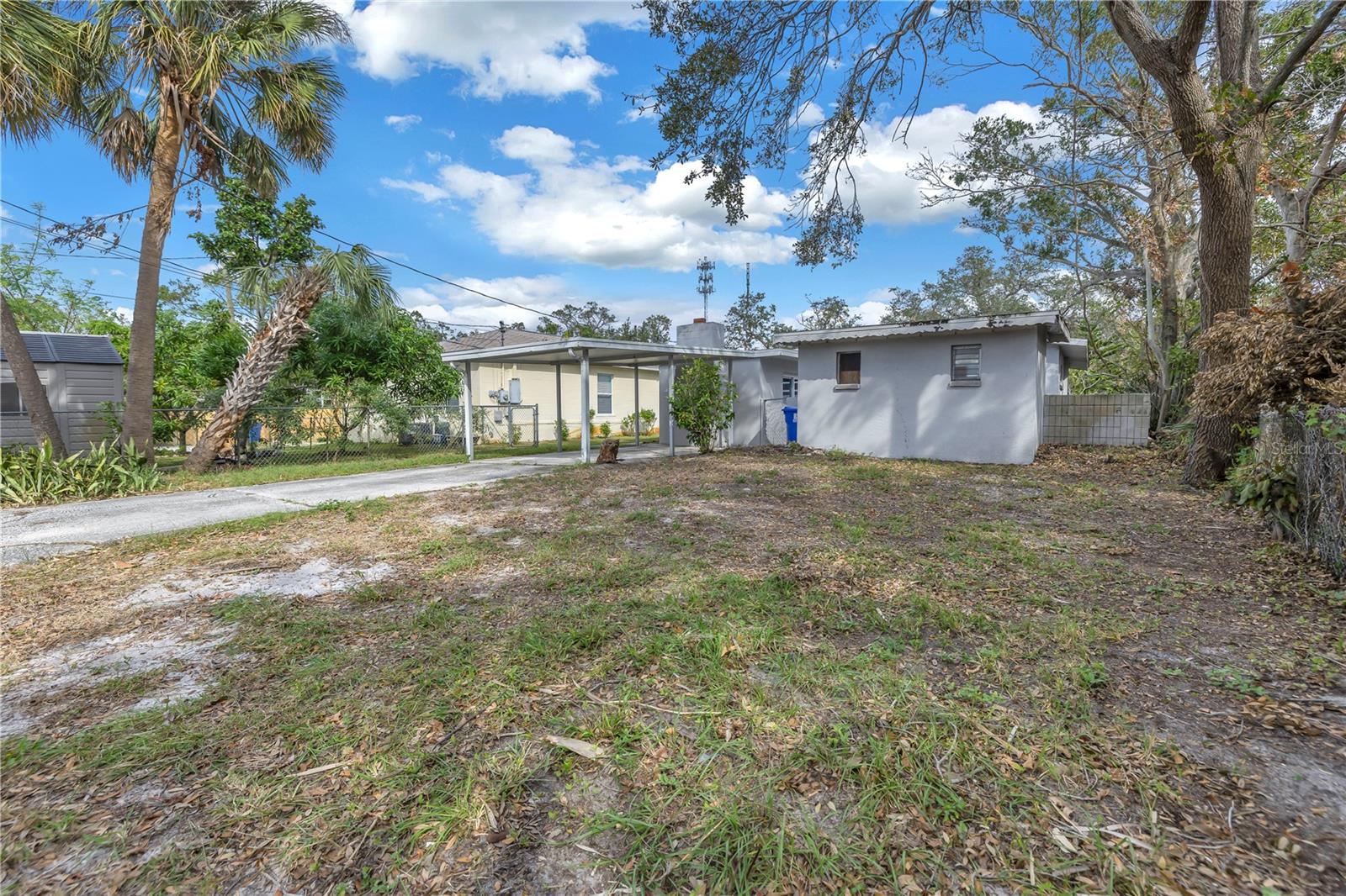 Good sized back yard with rear carport and extended driveway