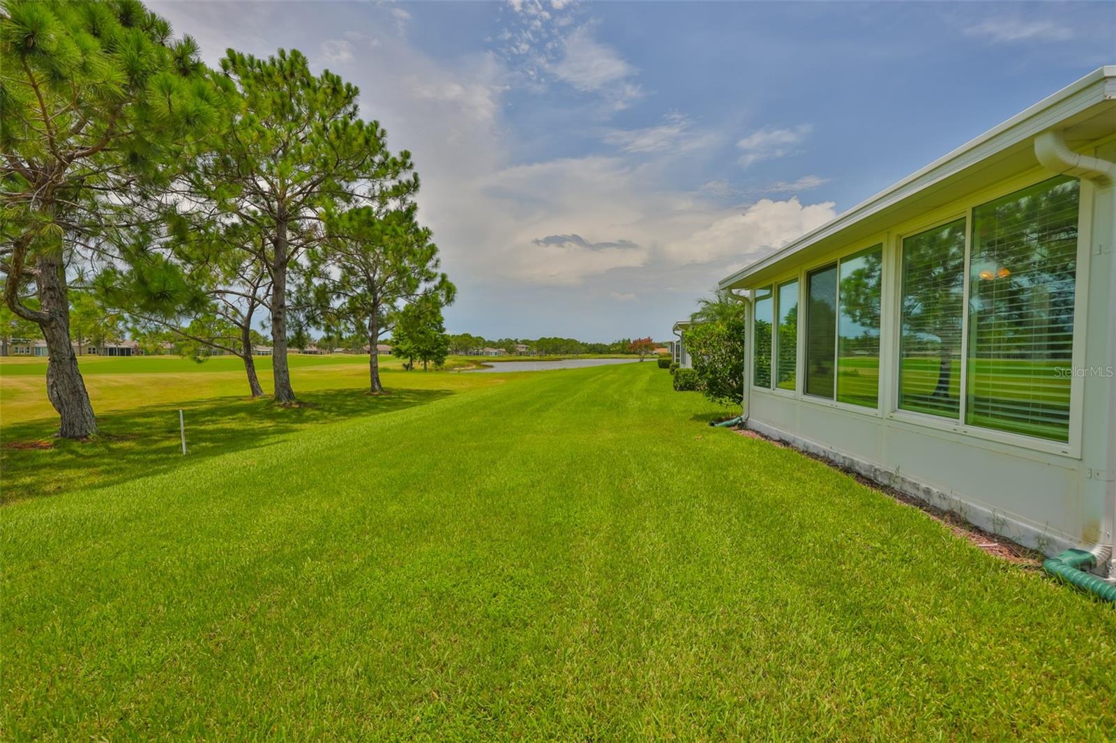 Backyard. Golf course and pond areas.