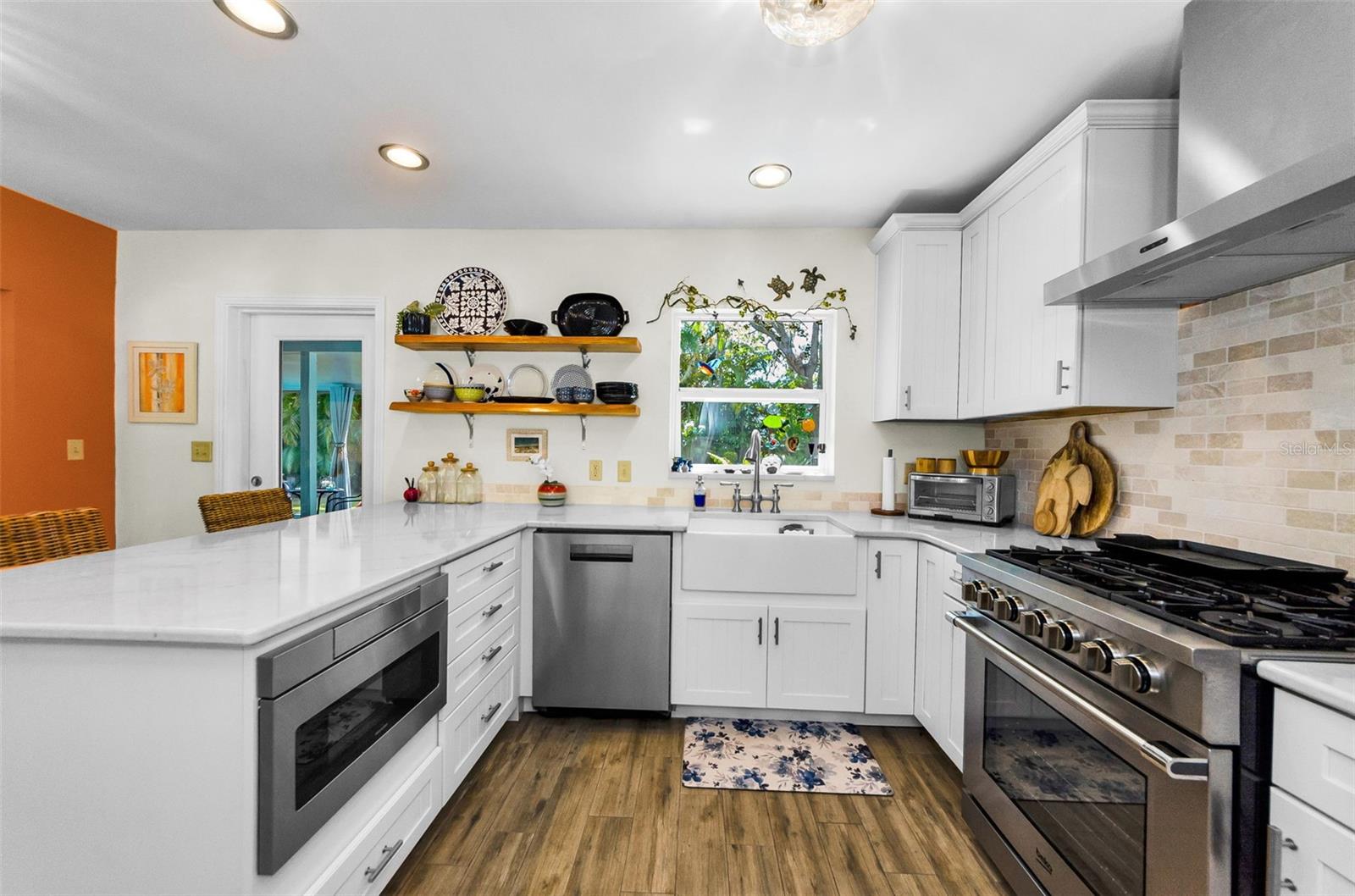 Updated Kitchen with Stainless Appliances, Quartz Counters and Gas Range