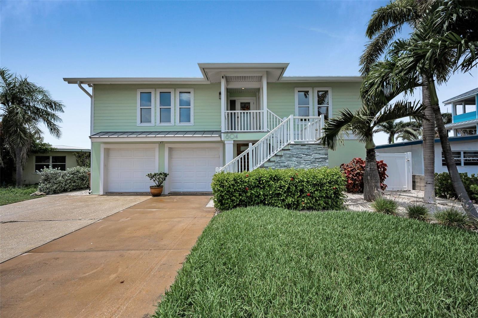 Sun-Drenched Serenity: Renovated Key West Waterfront Oasis in Bay Point Estates!