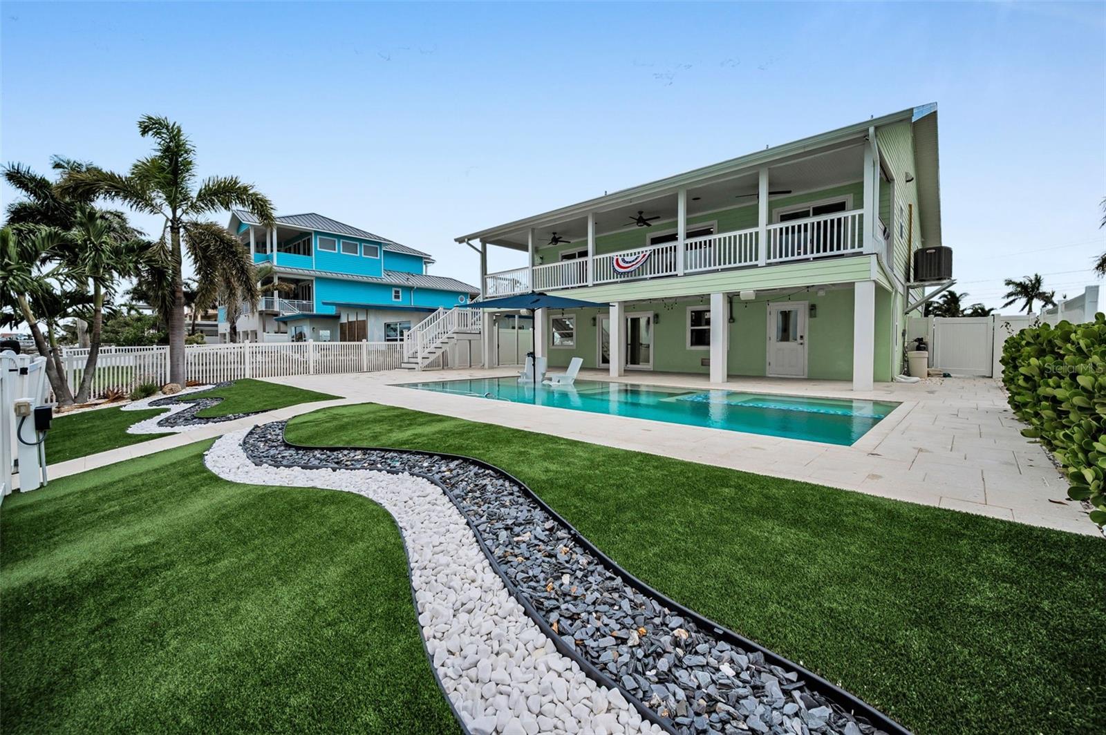 Waterfront, Resort Style Living, Island Style — Breathtaking Renovation, Prime Florida Locale!