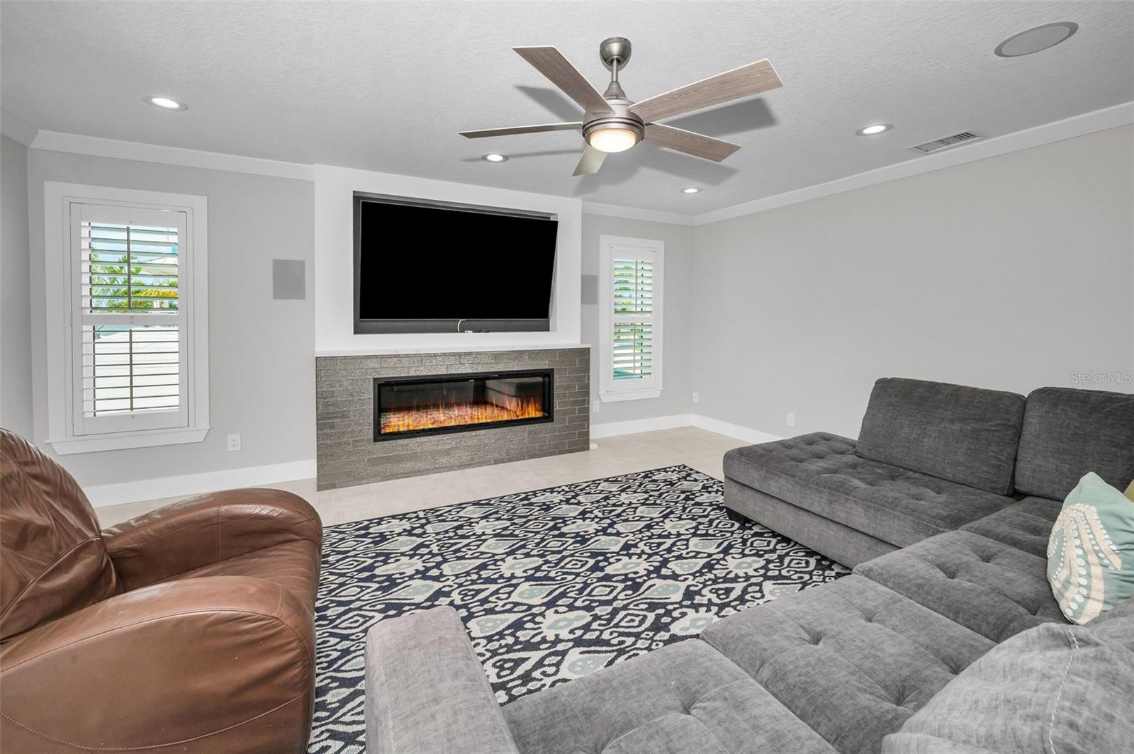 Living Room off the Kitchen with a Cozy Electric Fireplace.