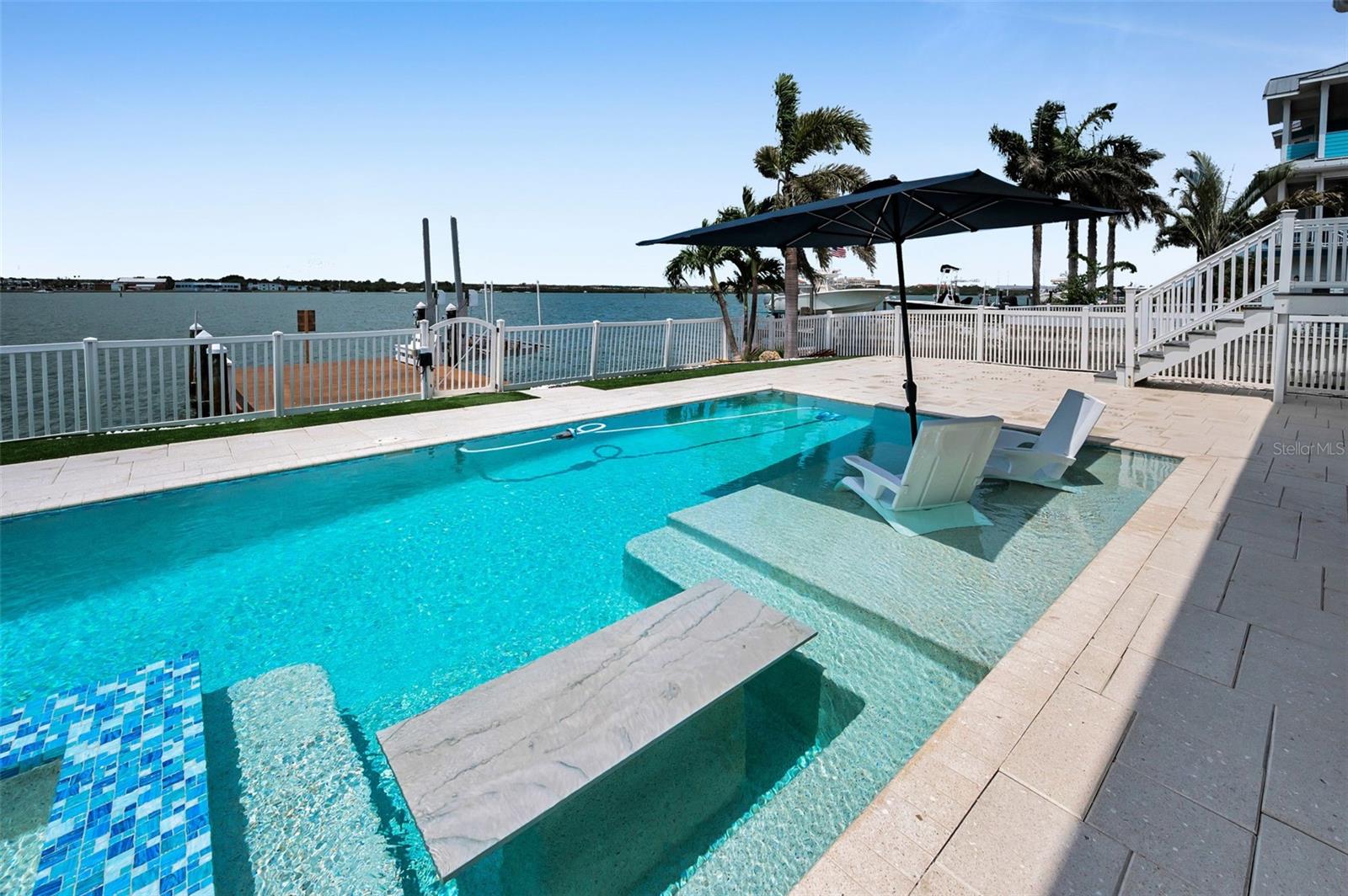 New Resort Style Pool with sun shelf, oversized hot tub and swim up table