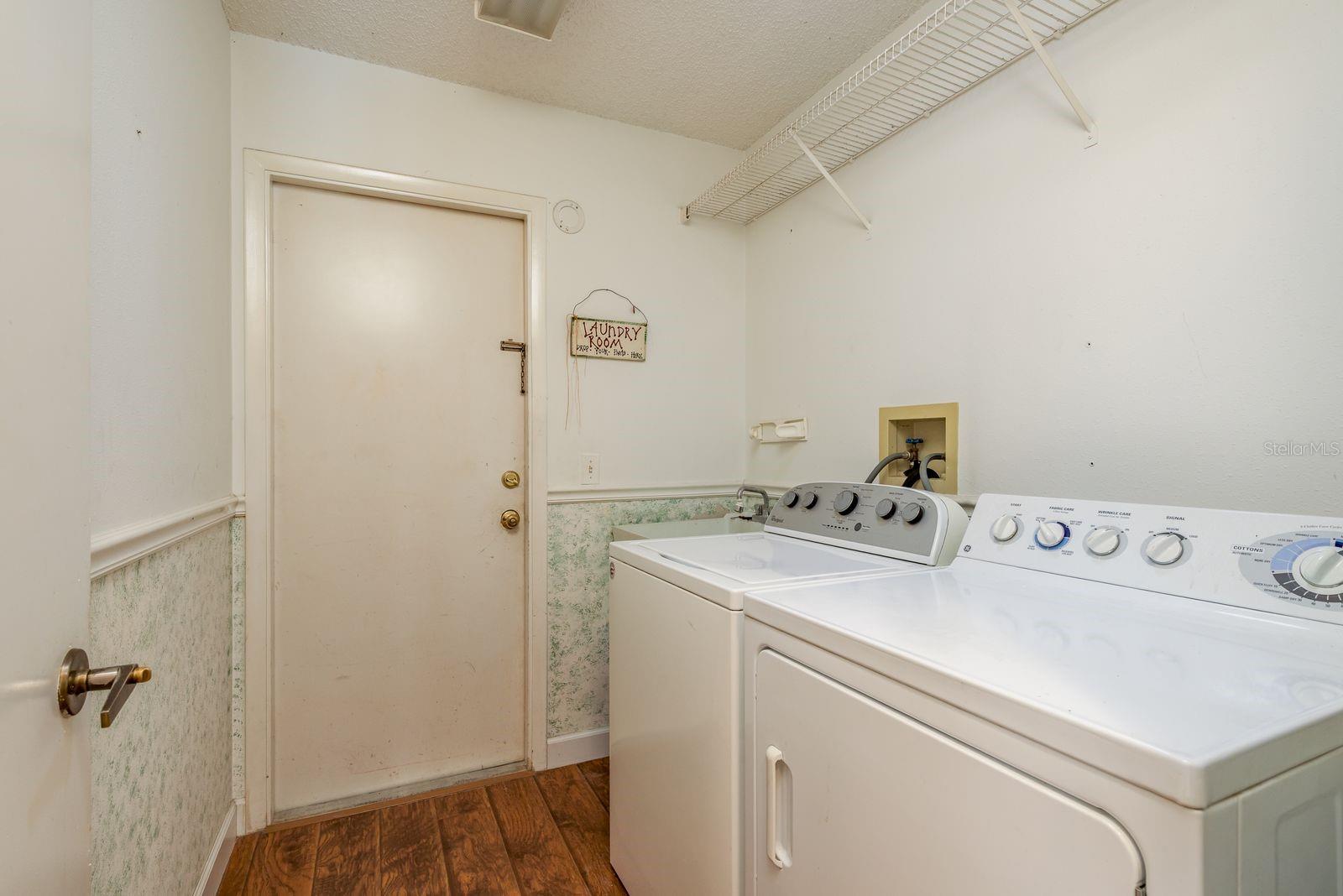 Laundry goes in to garage