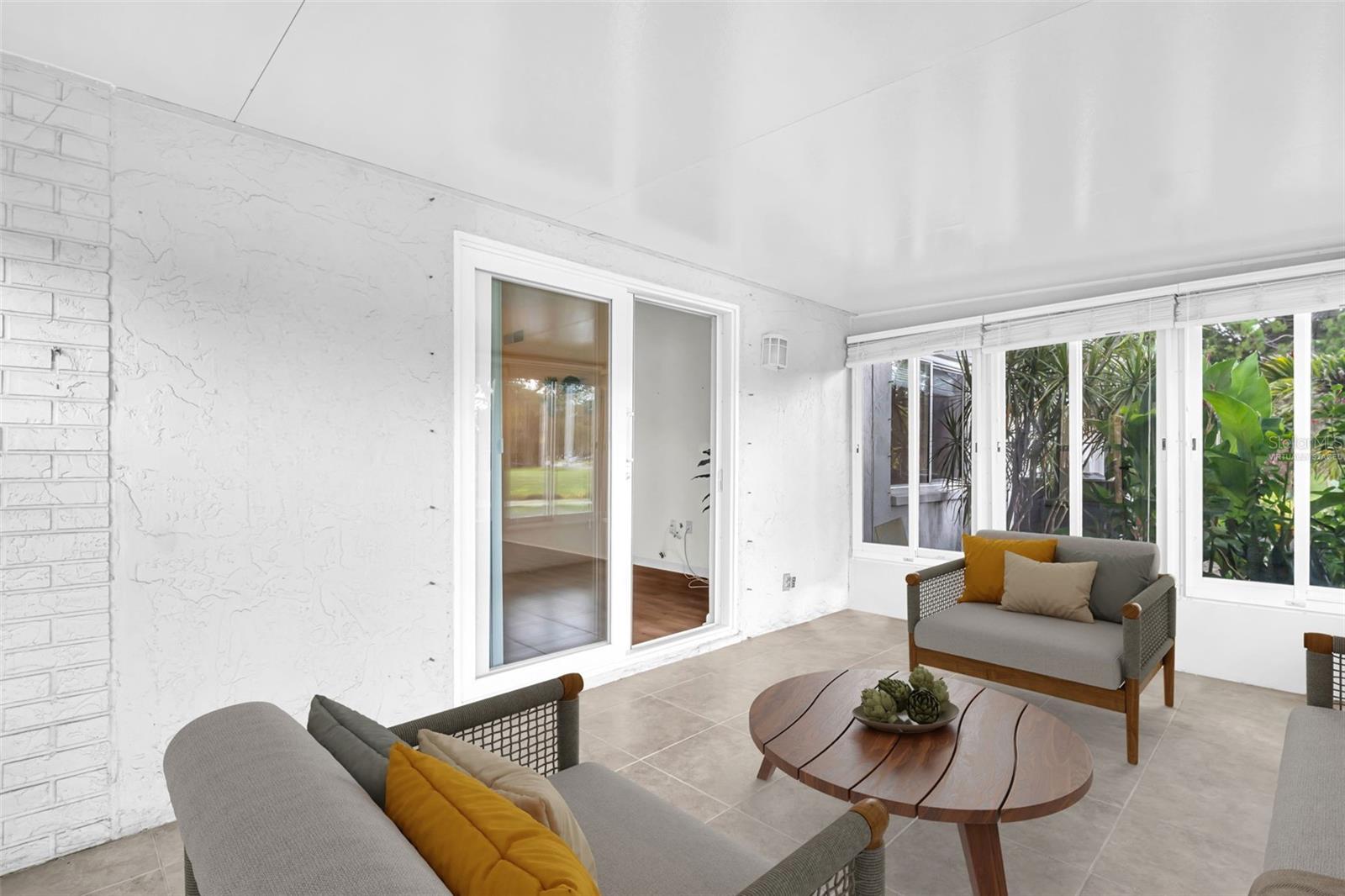 Virtually Staged - You'll enjoy your morning coffee in the lanai year-round~