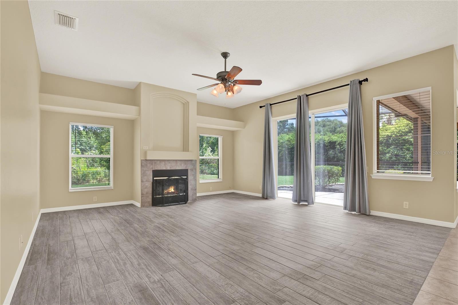 Cozy family room with wood burning fireplace