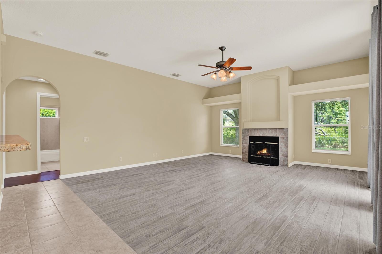 Cozy family room with wood burning fireplace