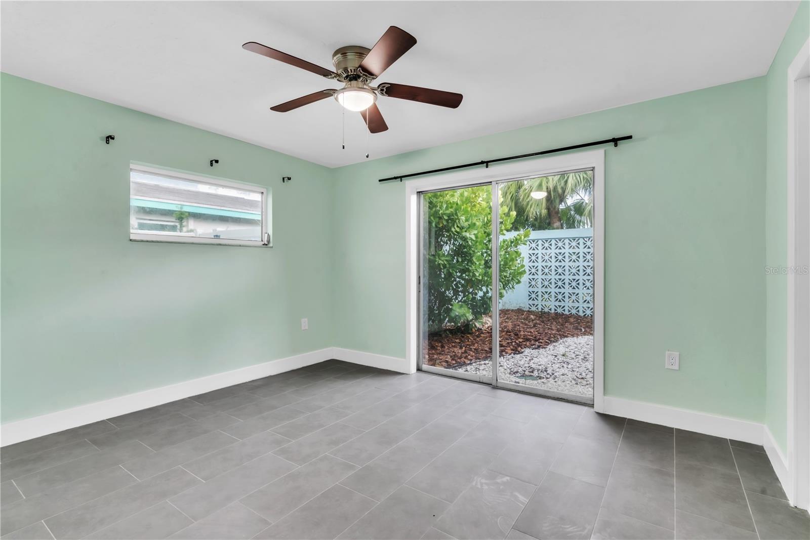 2nd bedroom with view of the courtyard