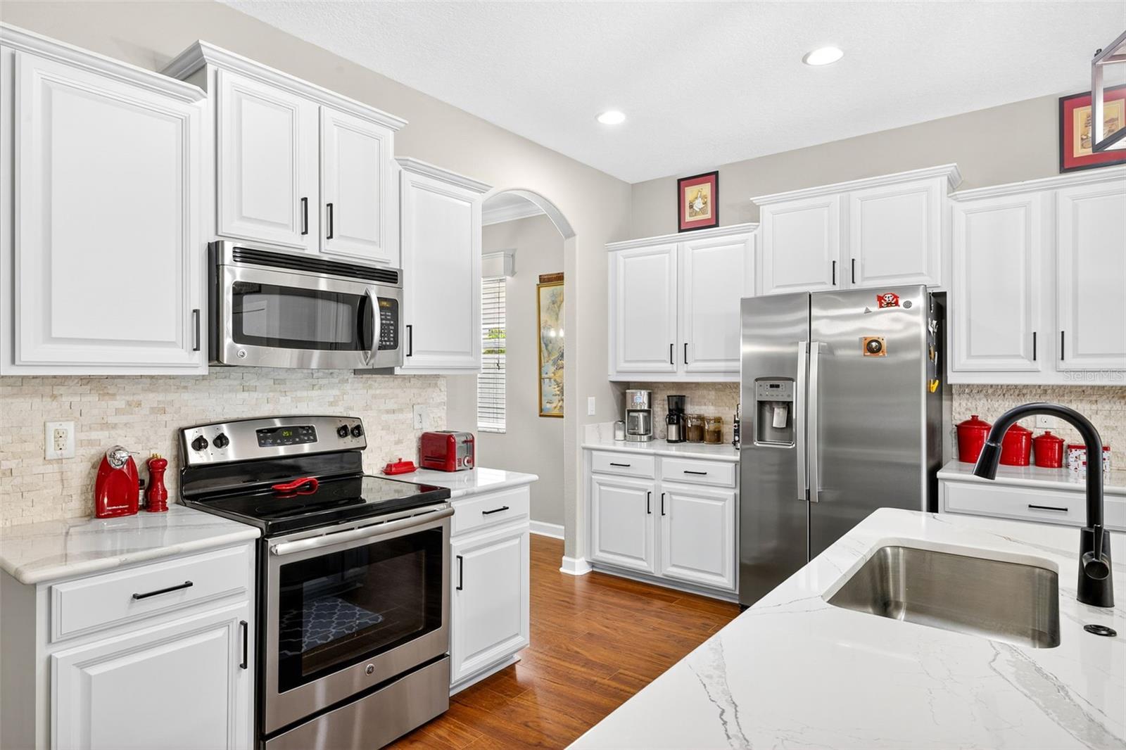 remodeled kitchen features Cambria quartz countertops