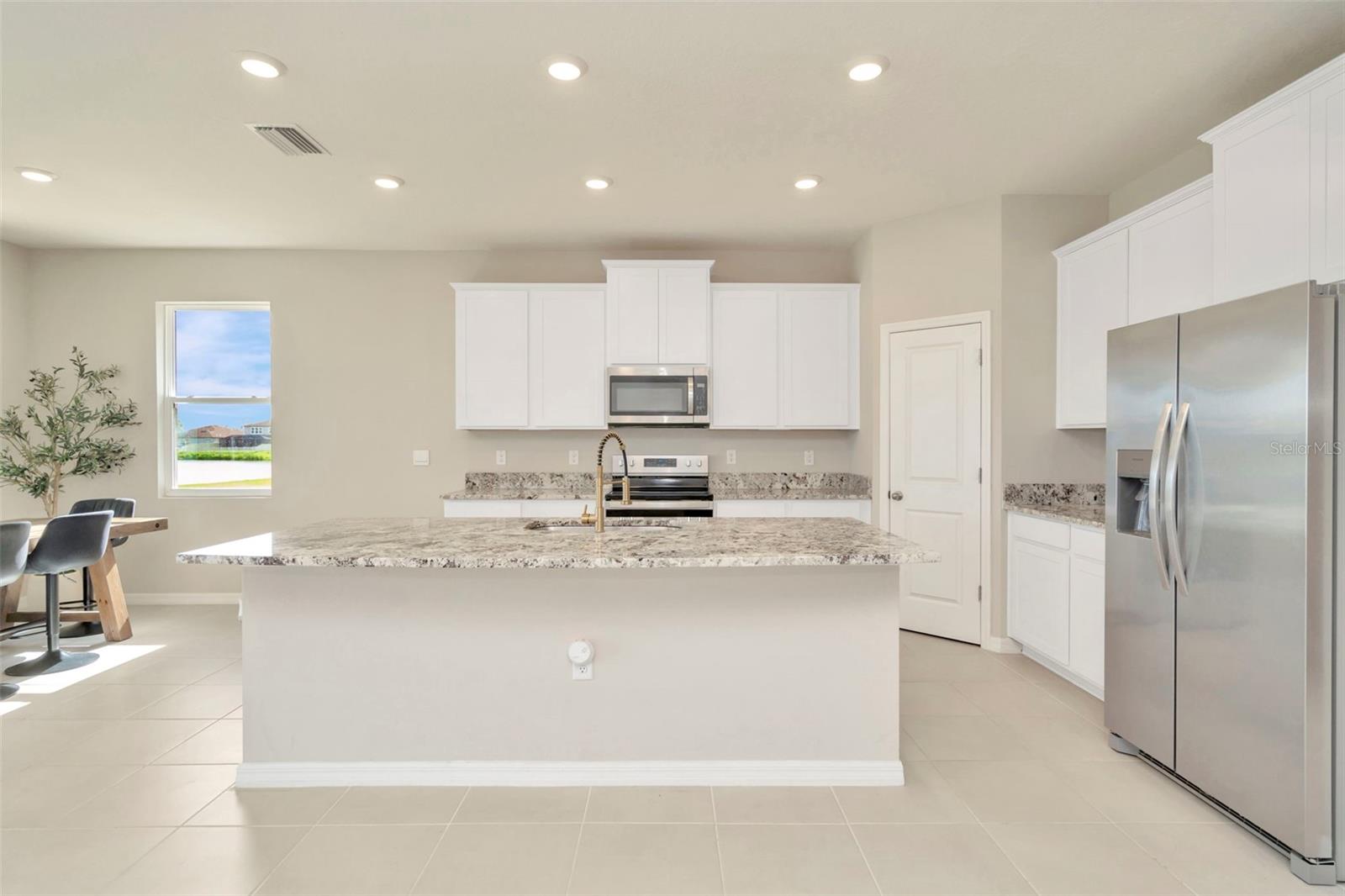 Your beautiful kitchen. Check out the white cabinet and center island