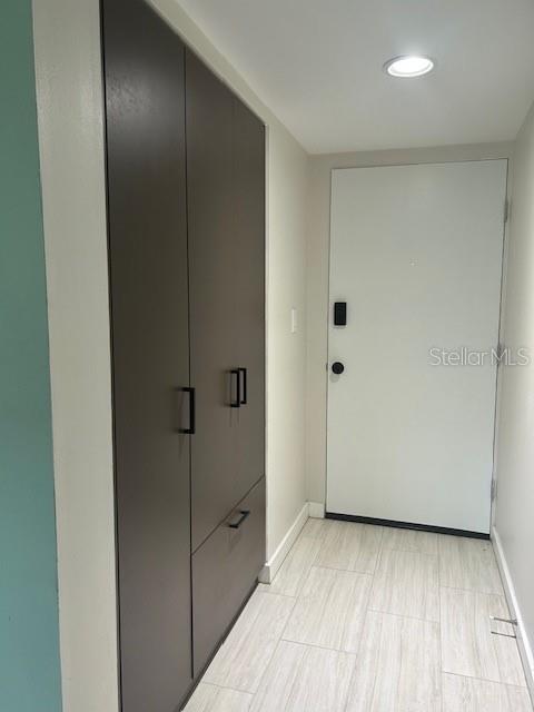 Entrance with storage closet