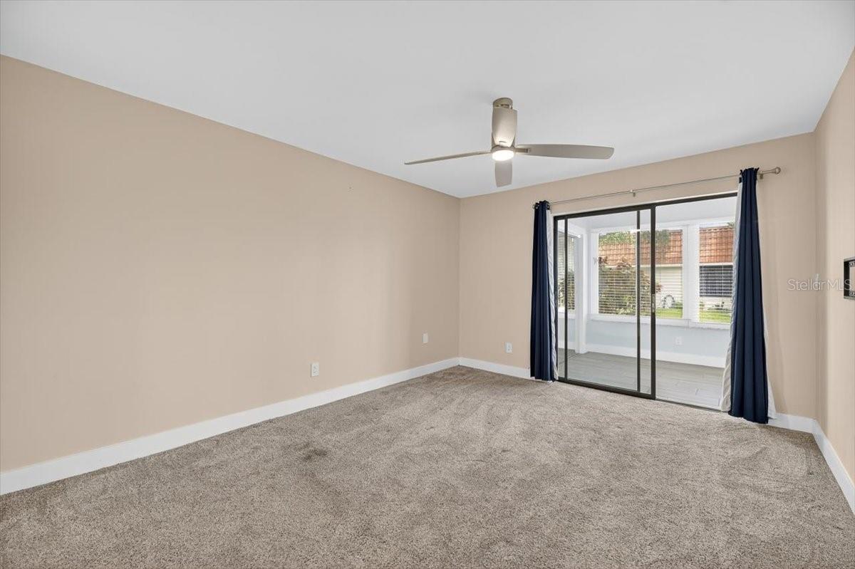 Entry to master bedroom with access to enclosed porch.