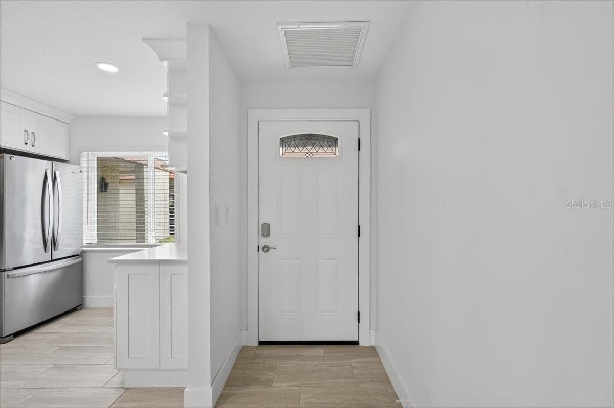 Main entry door view from hall area.