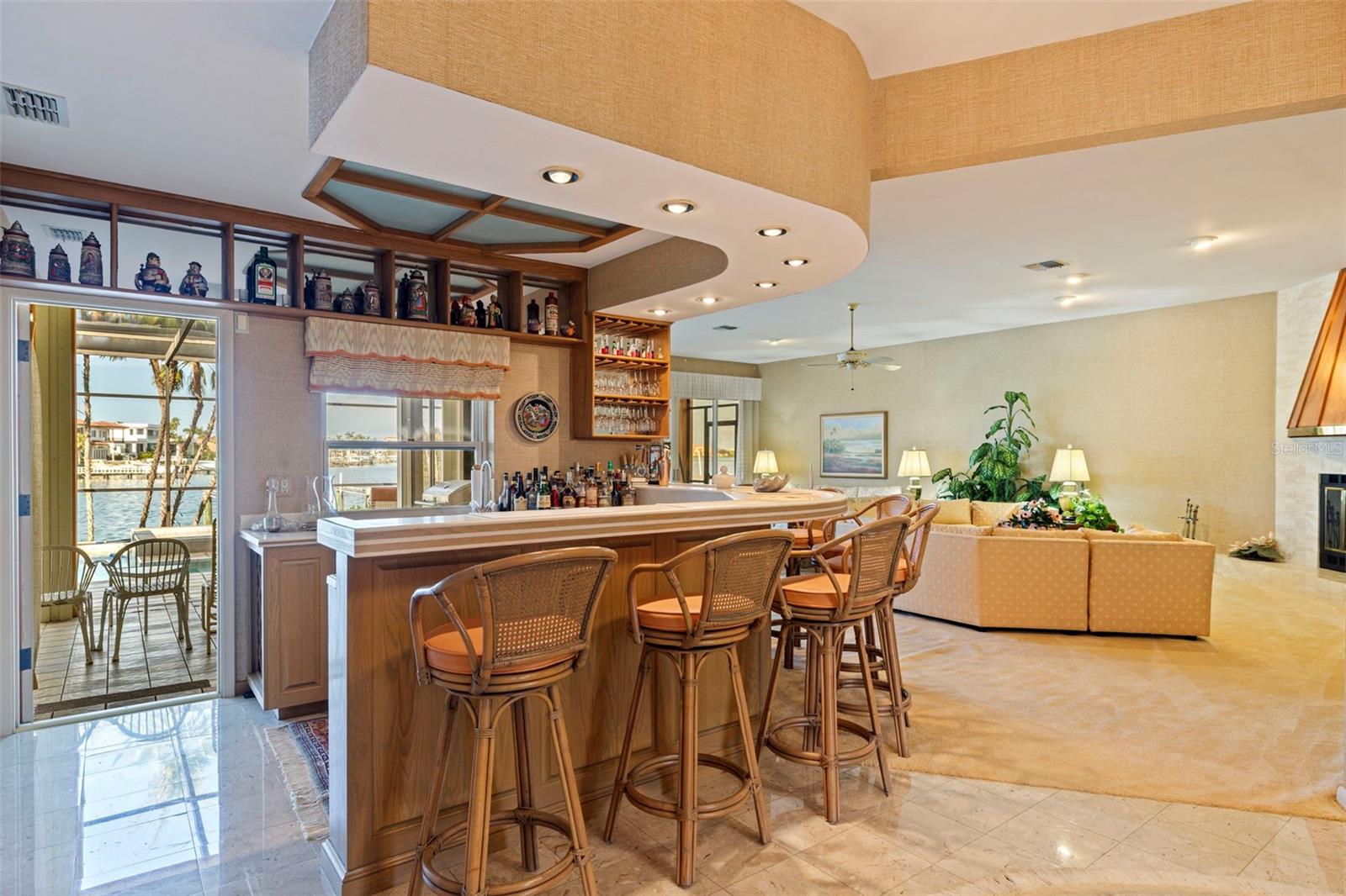 Full wet bar where you can serve to the pool area through the pass-through