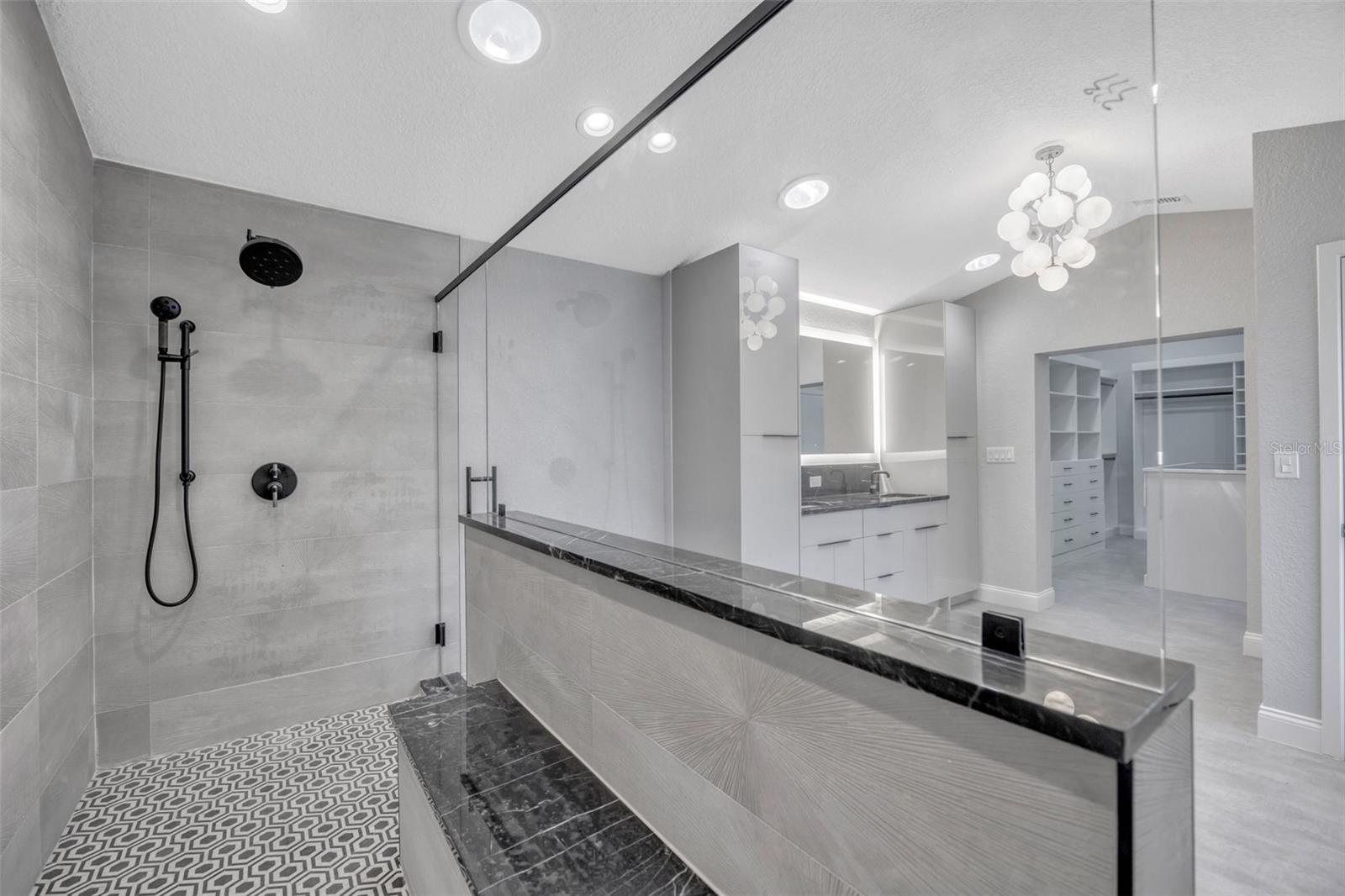 Primary Shower with Marble Flooring