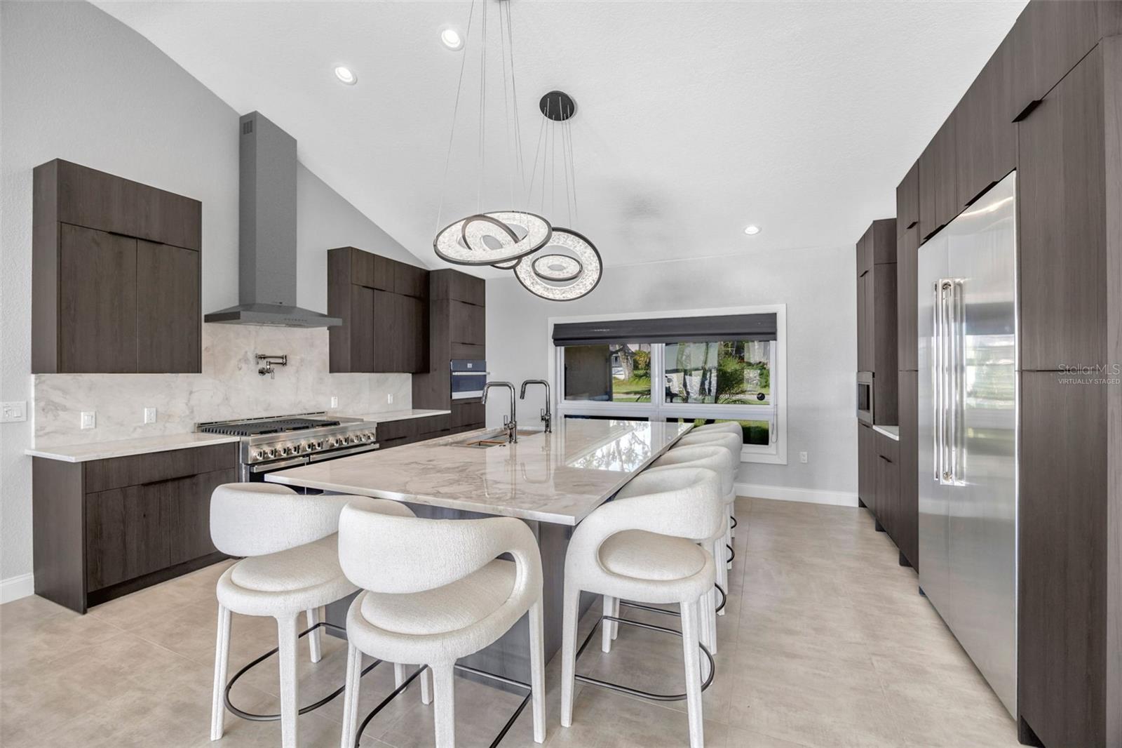 Gourmet Kitchen with NEW JennAir Appliances This photo has been virtually staged