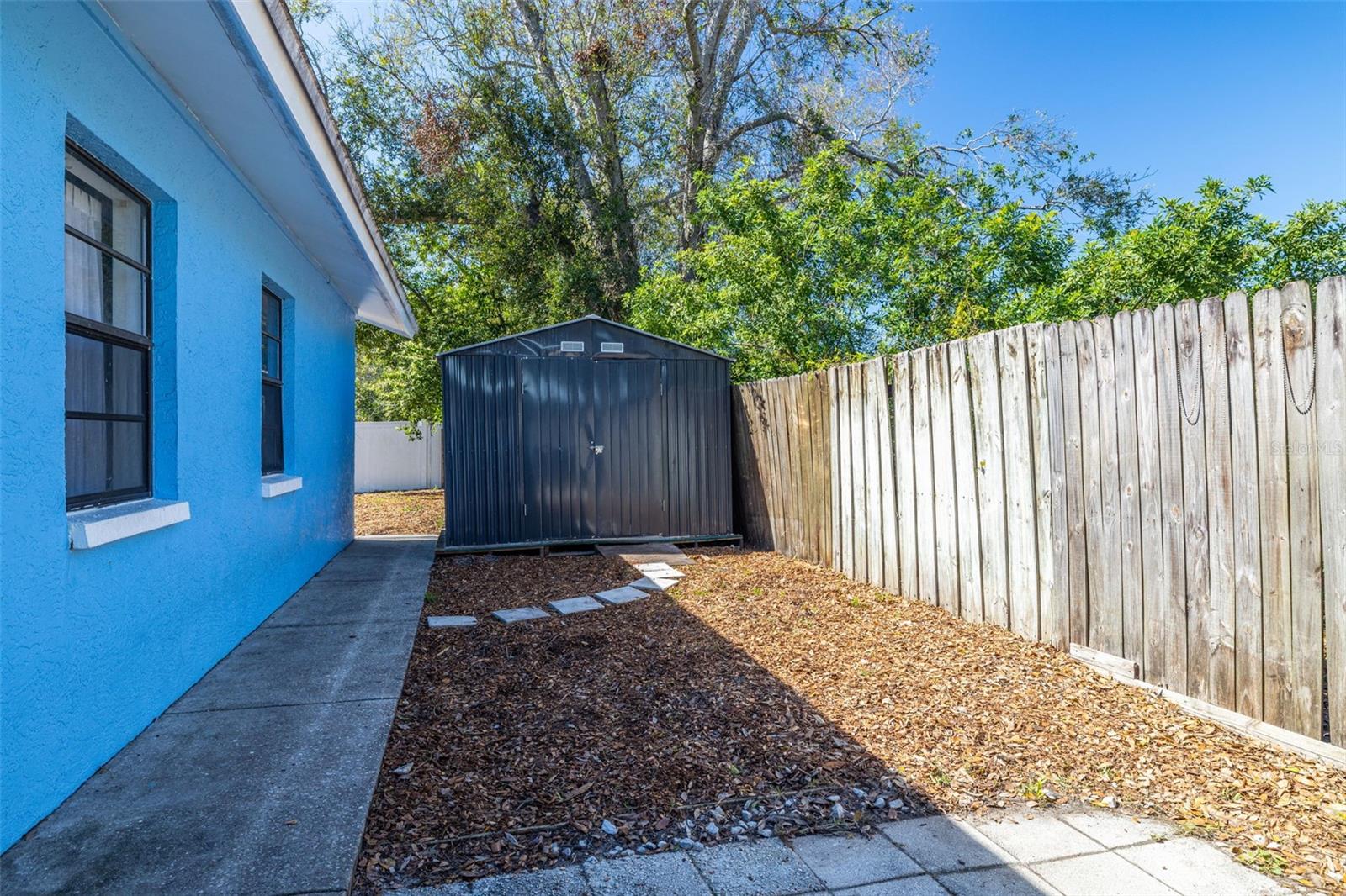 Fenced Side Yard & new Shed