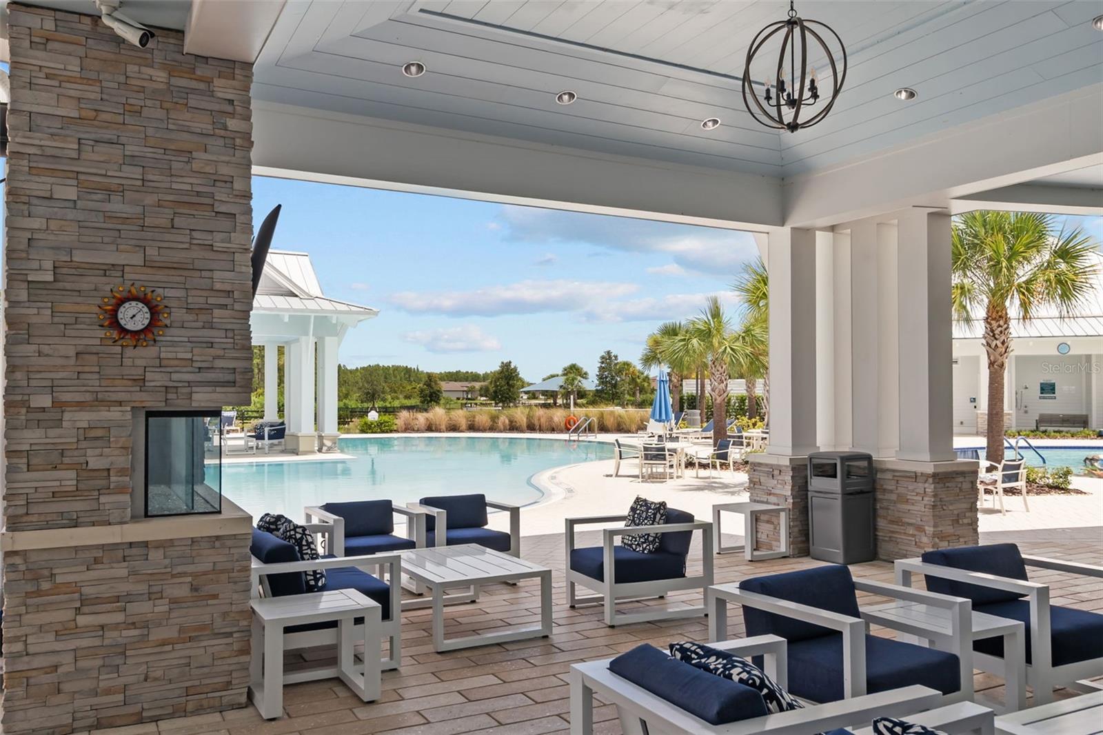 Resort-style pool with lap lanes, resistance pool and plenty of seating.