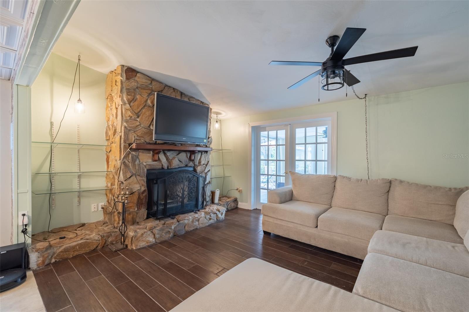 LIVING ROOM W/ FRENCH DOORS/POOL ACCESS