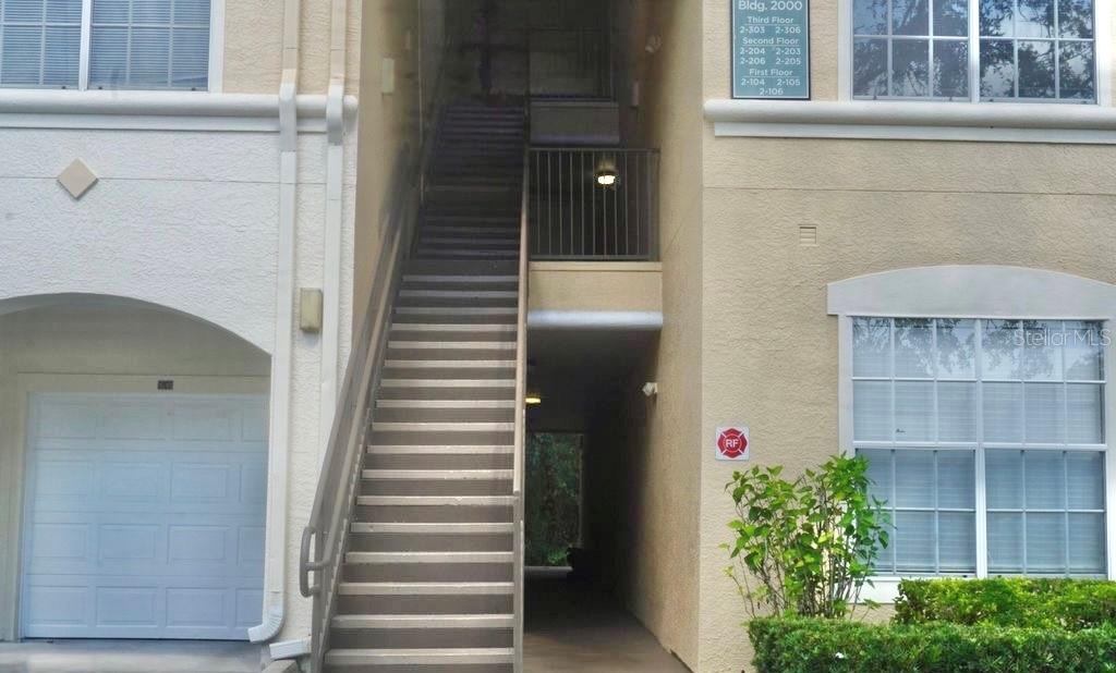 Entrance with garage immediately below
